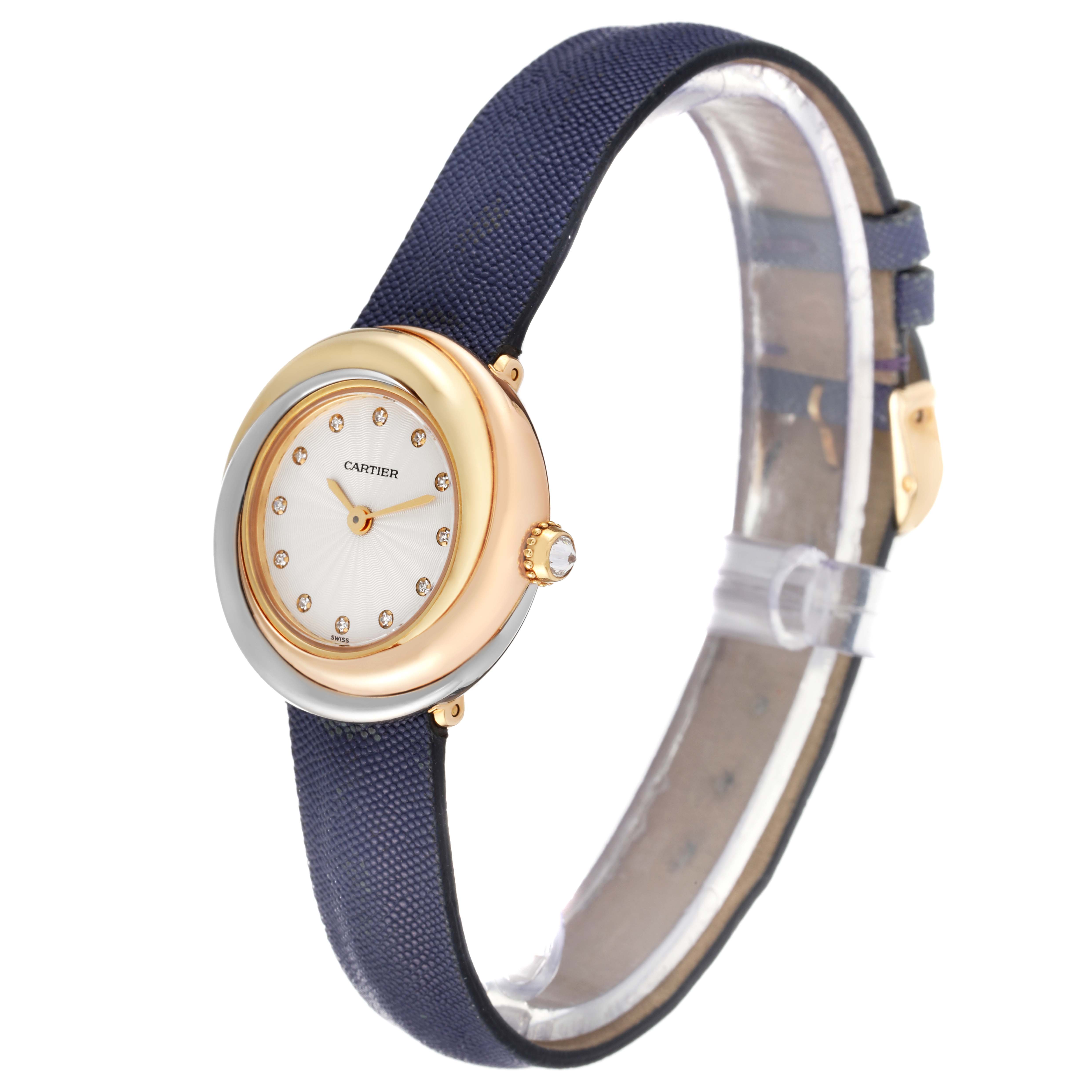 The Cartier Trinity WG200256 Women
s Yellow Gold Silver Dial WG200256 Women
s Yellow Gold Silver Dial model watch is shown at an angled view, displaying its face, round bezel, crown, and strap.