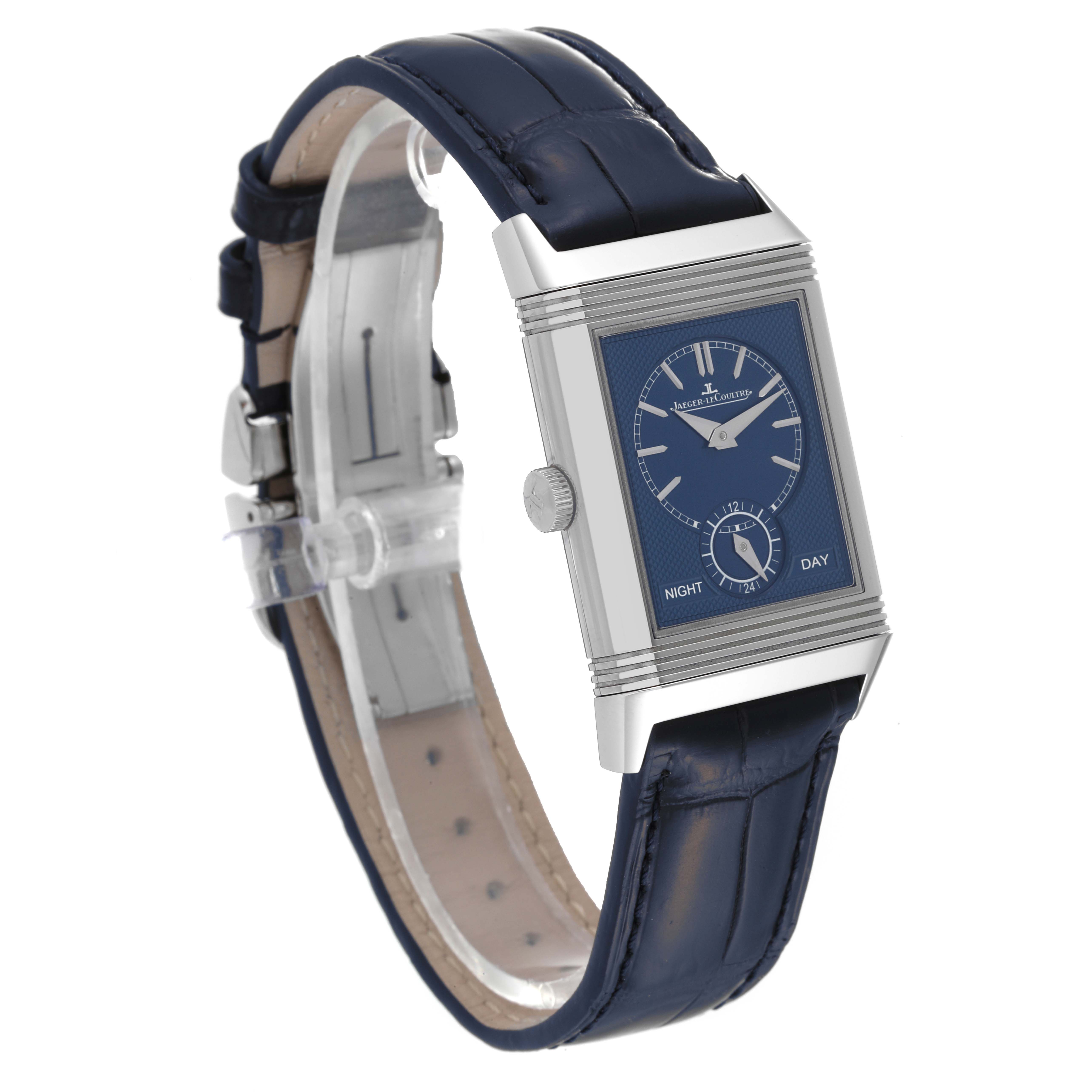 The Jaeger LeCoultre Reverso Q3908420 Men
s Stainless Steel Silver Dial Q3908420 Men
s Stainless Steel Silver Dial watch is shown at an oblique angle, displaying its face, crown, and leather strap.