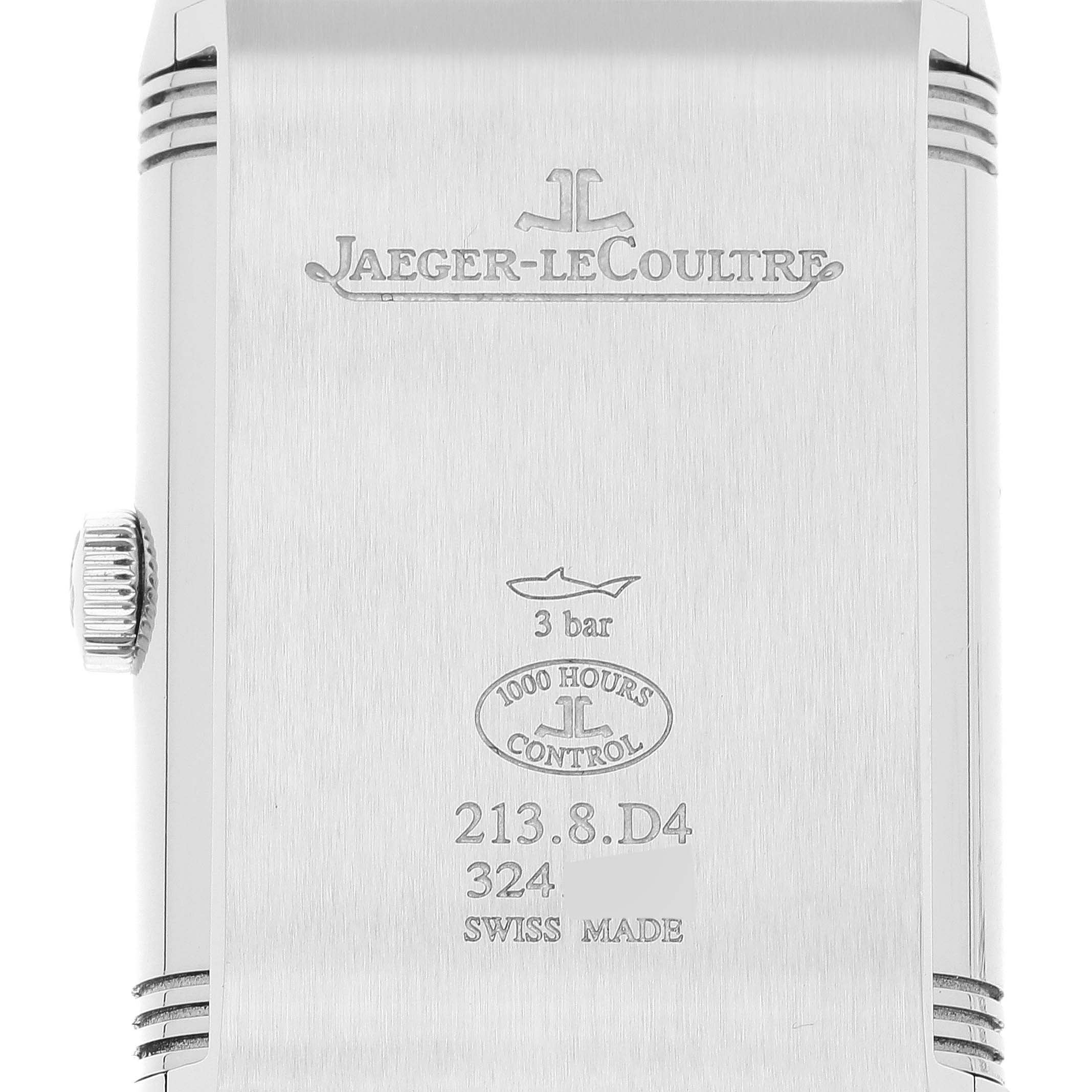 This image shows the back of the Jaeger-LeCoultre Reverso watch case with engraving details.