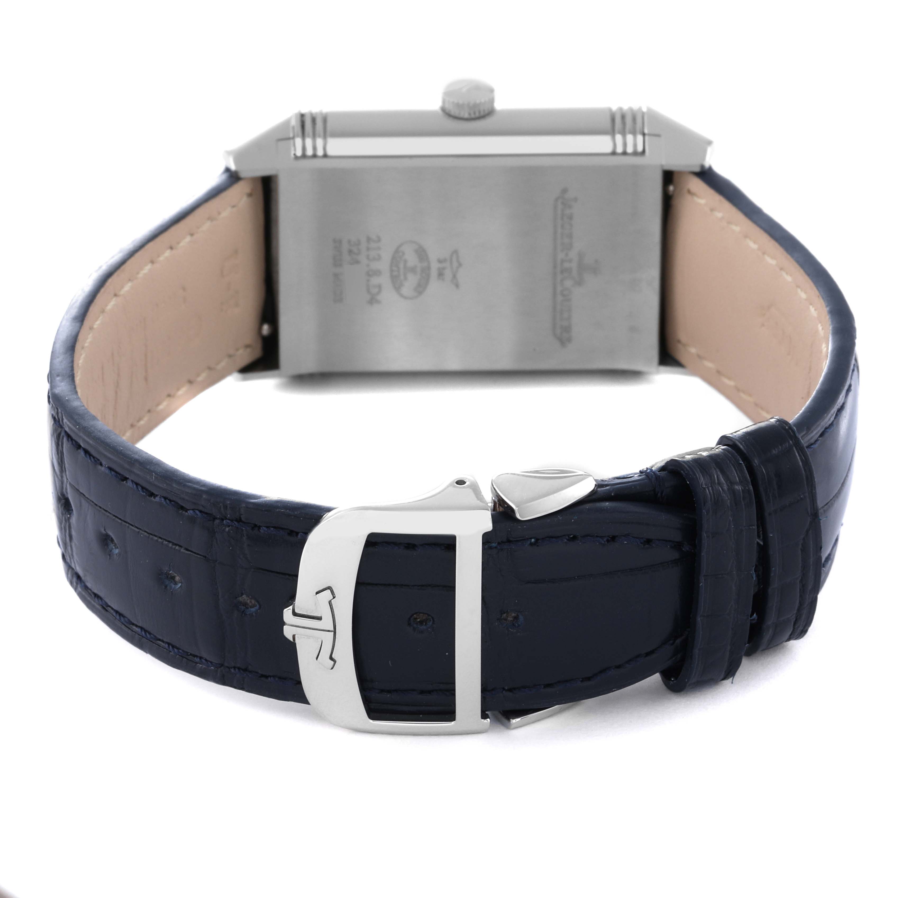 The image shows the back and clasp of a Jaeger LeCoultre Reverso Q3908420 Men
s Stainless Steel Silver Dial Q3908420 Men
s Stainless Steel Silver Dial watch, along with its leather strap and buckle.