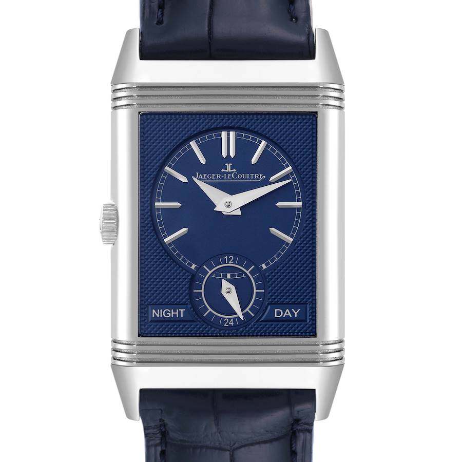 The image shows a front view of a Jaeger LeCoultre Reverso watch, highlighting its blue dial, night/day indicator, and leather strap.