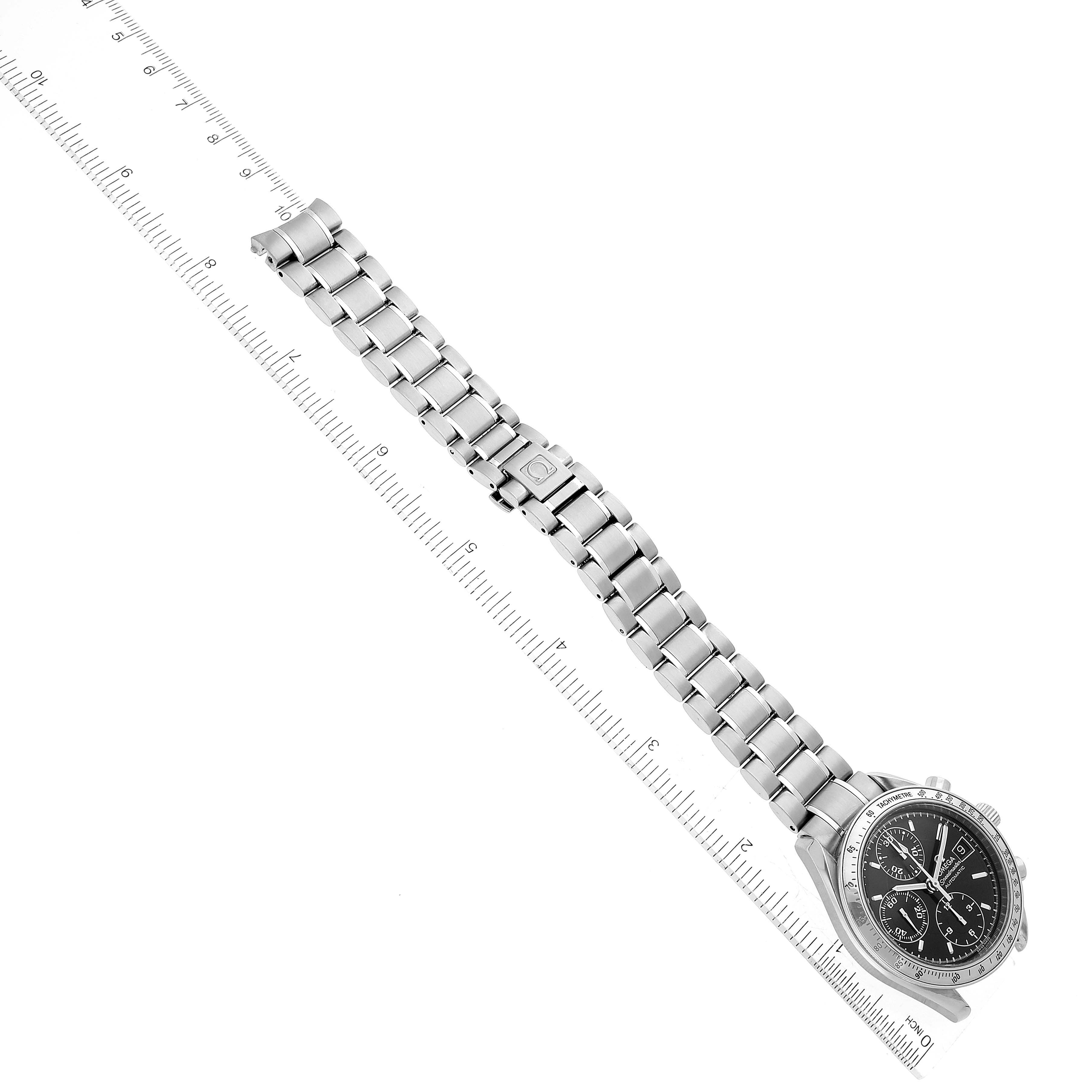 The image shows an Omega Speedmaster 3513.50.00 Men's Stainless Steel Black Dial 3513.50.00 Men's Stainless Steel Black Dial wristwatch with a full-length metal bracelet and a black dial at an overhead angle.