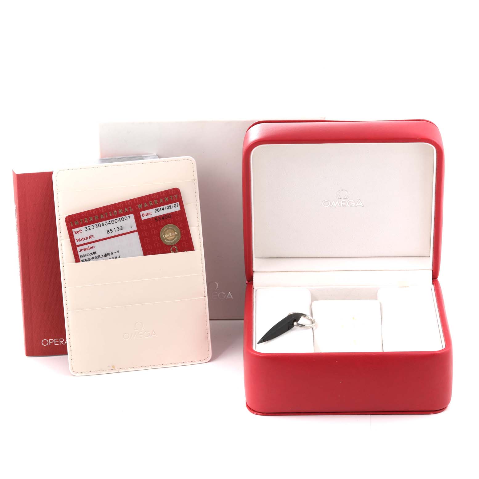 This image shows the box, warranty card, and cardholder for the Omega Speedmaster 323.30.40.40.04.001 Men
s Stainless Steel White Dial 323.30.40.40.04.001 Men
s Stainless Steel White Dial watch, all from a front angle.