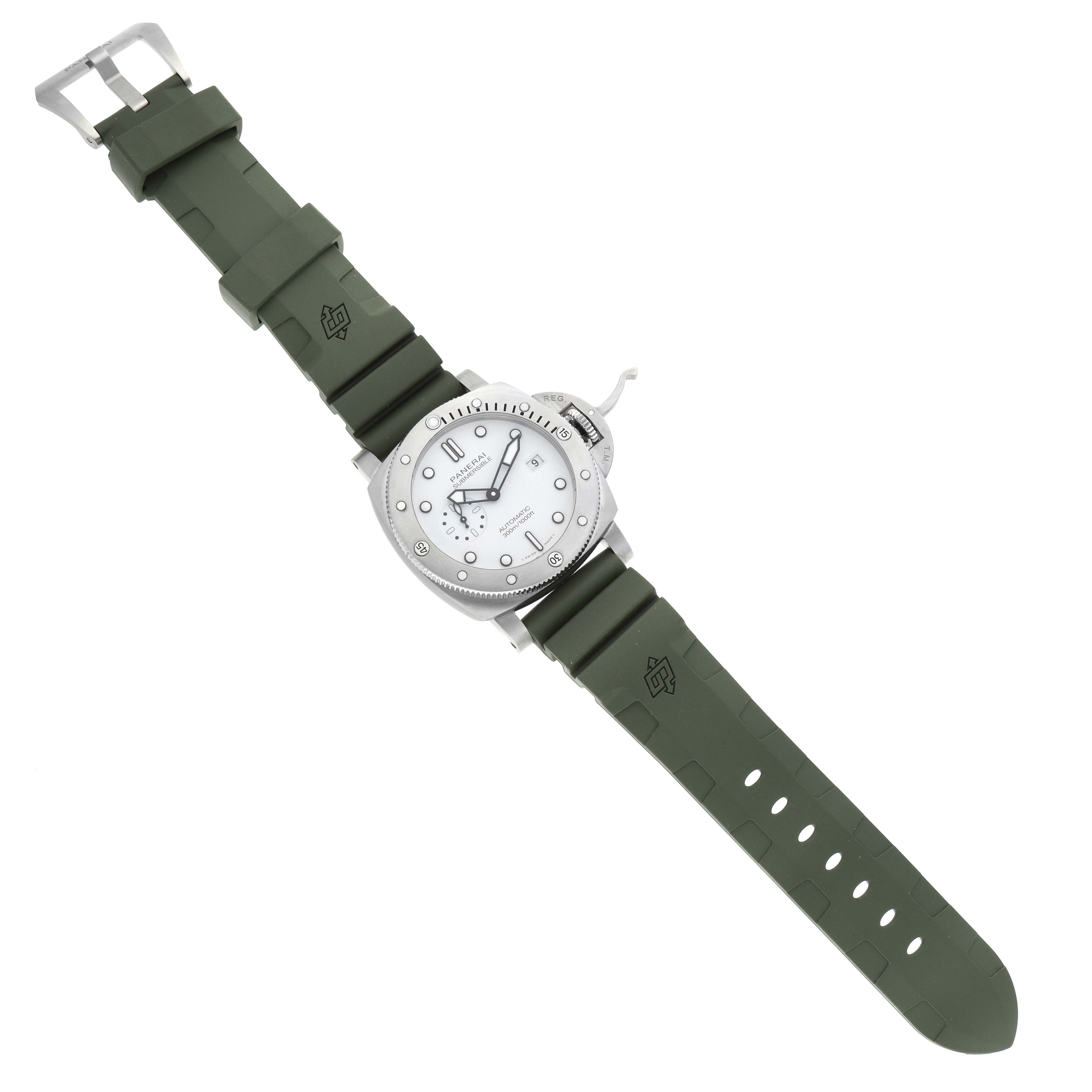 The image shows a Panerai Submersible PAM01595 Men's Stainless Steel White Dial PAM01595 Men's Stainless Steel White Dial watch from a top-down angle, featuring a green rubber strap, stainless steel case, and white dial.
