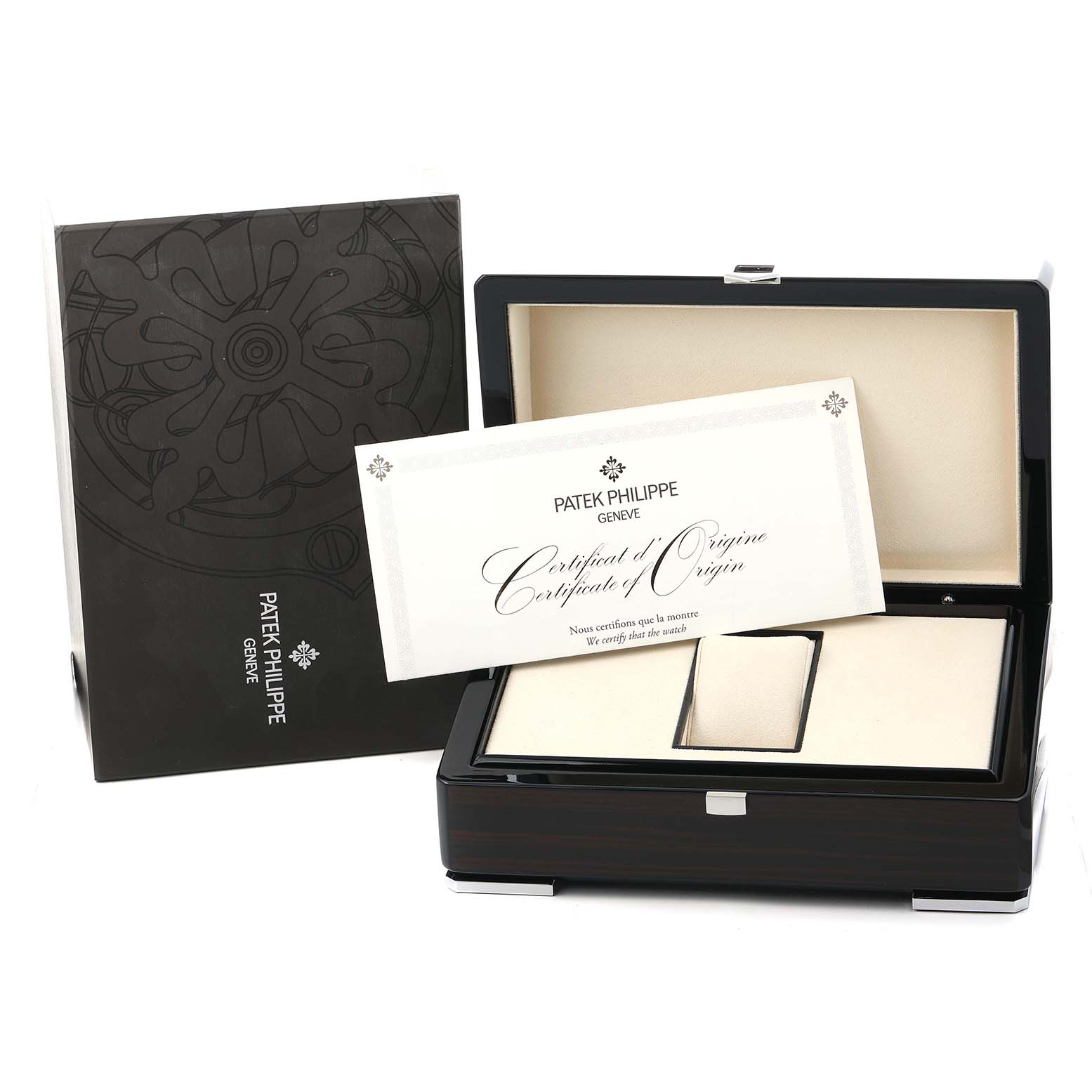 The image shows a Patek Philippe Complications 5172G Men
s White Gold Black Dial watch box and accessories, including a Certificate of Origin, from a front angle.
