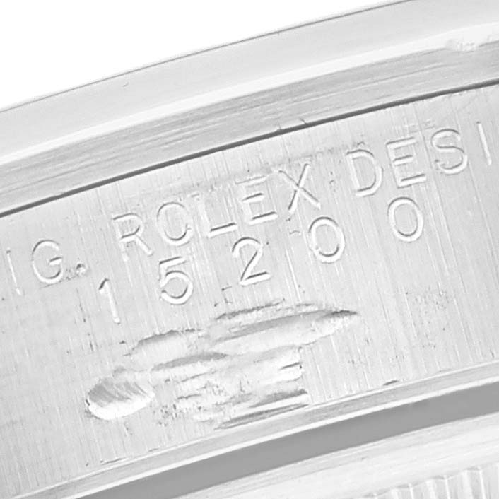 This is a close-up angle showing the engraved model number and "Rolex Design" text on the case of the Rolex Date 15200 Men's Stainless Steel White Dial 15200 Men's Stainless Steel White Dial watch.