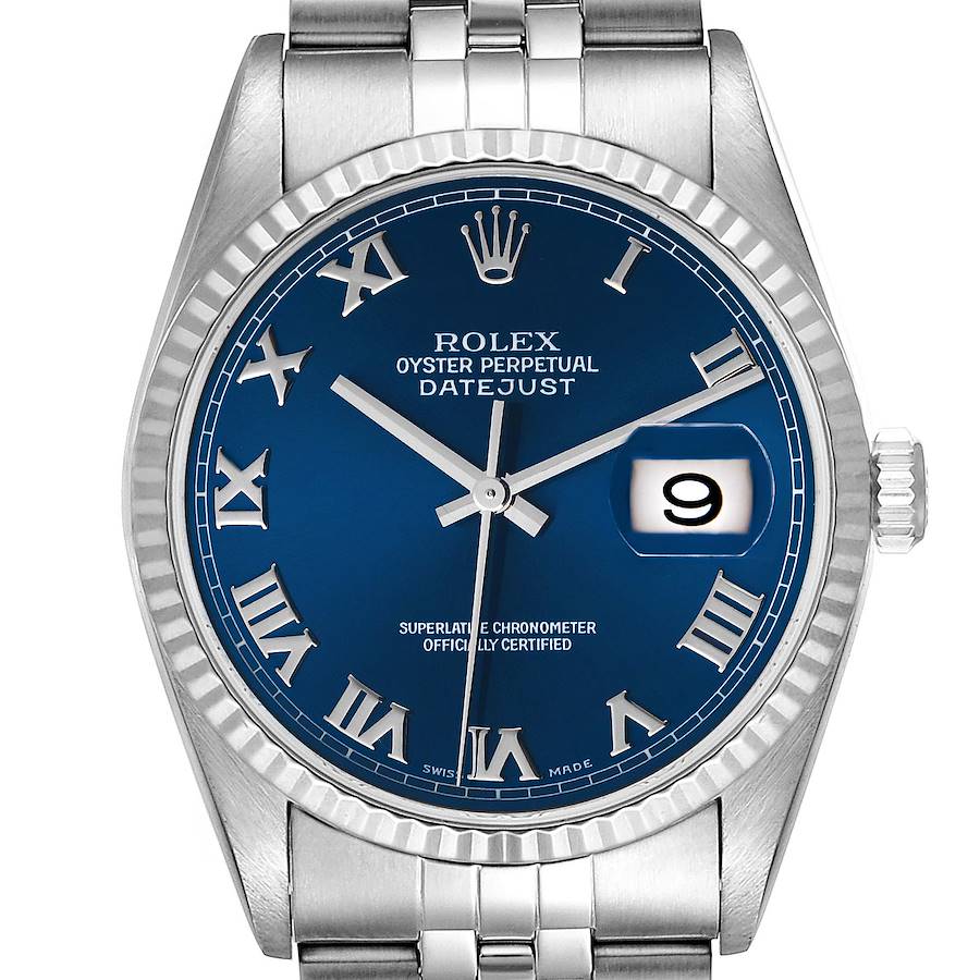 The Rolex Datejust model is shown from the front, highlighting its blue dial, Roman numerals, fluted bezel, and date display.