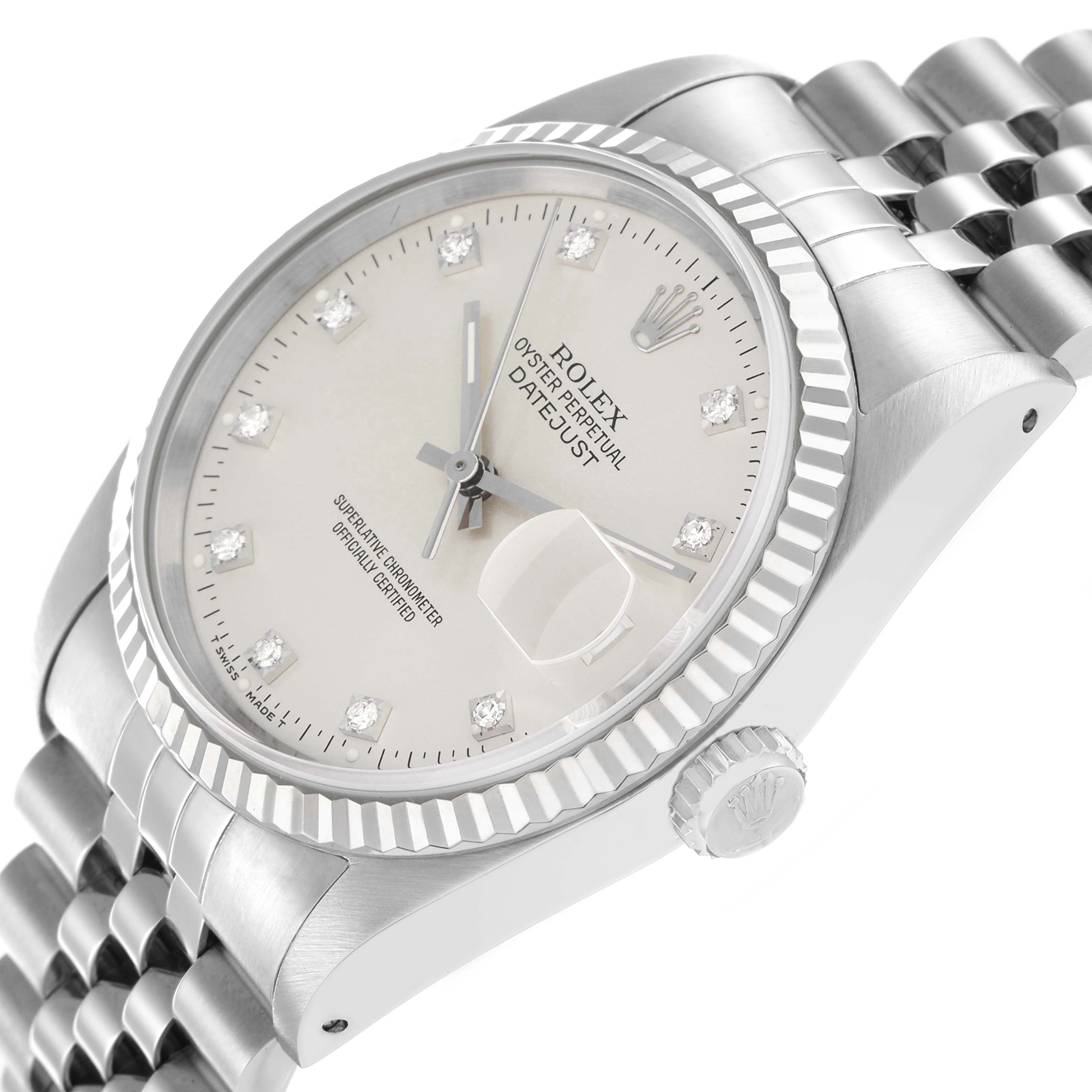 The Rolex Datejust 16234 Men
s Stainless Steel Silver Dial watch is shown at an angle highlighting the face, fluted bezel, and a portion of the bracelet.