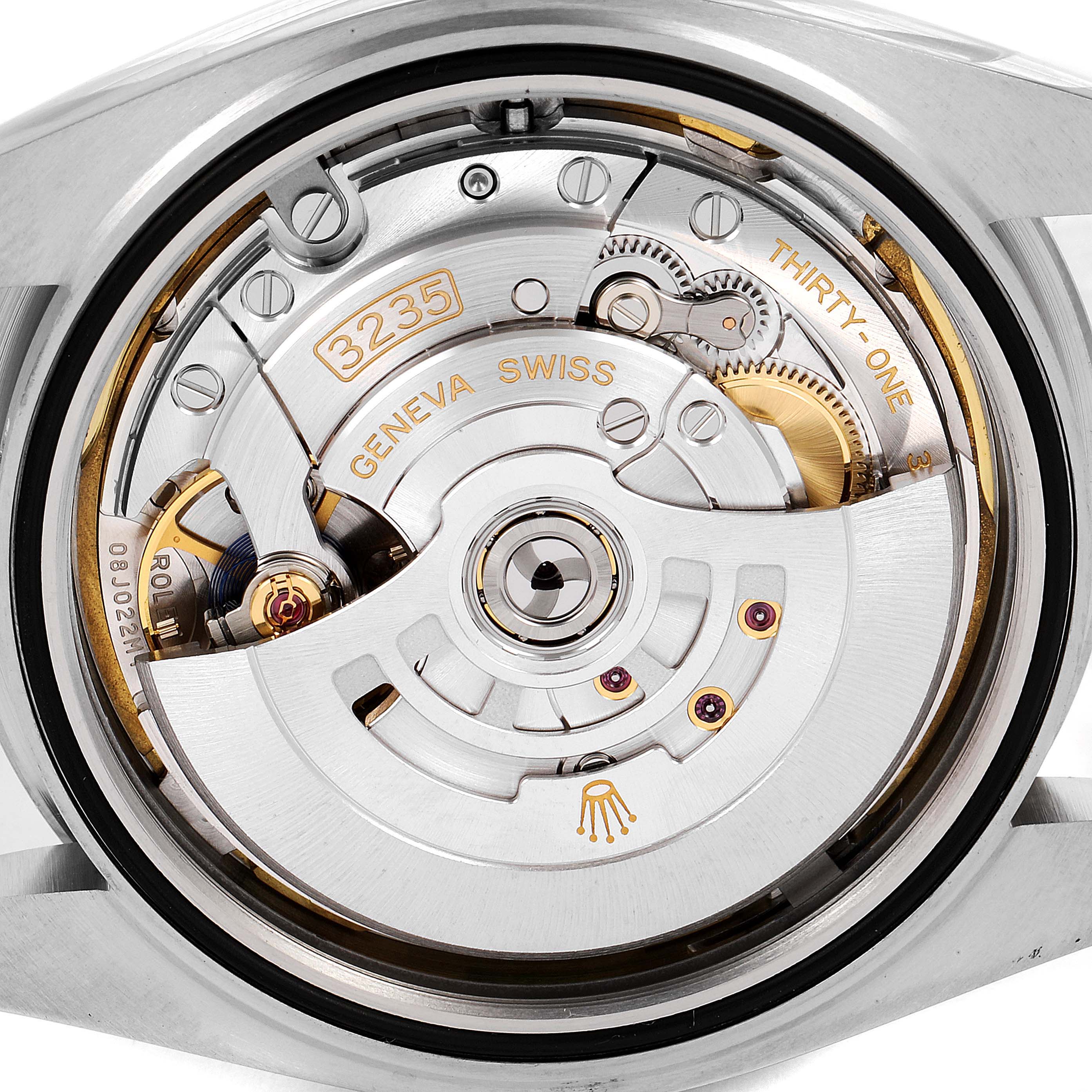 This is a close-up view of the movement and mechanics of a Rolex Datejust 41 126334 Men
s Stainless Steel White Dial 126334 Men
s Stainless Steel White Dial watch, highlighting the intricate inner workings.