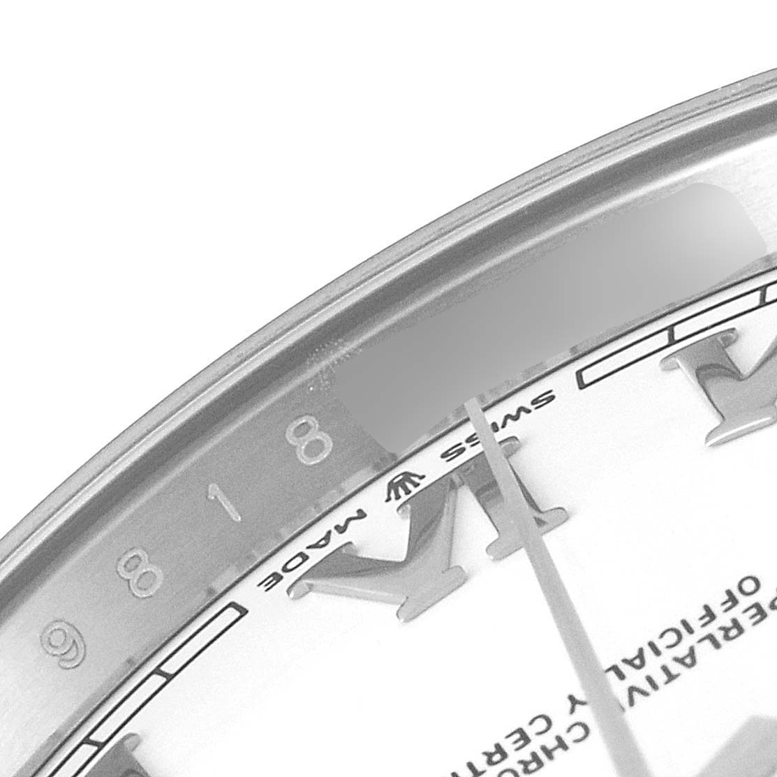 This image shows a close-up of the dial and part of the bezel of a Rolex Datejust 41 126334 Men
s Stainless Steel White Dial 126334 Men
s Stainless Steel White Dial watch, highlighting the "Swiss Made" text and hour markers.
