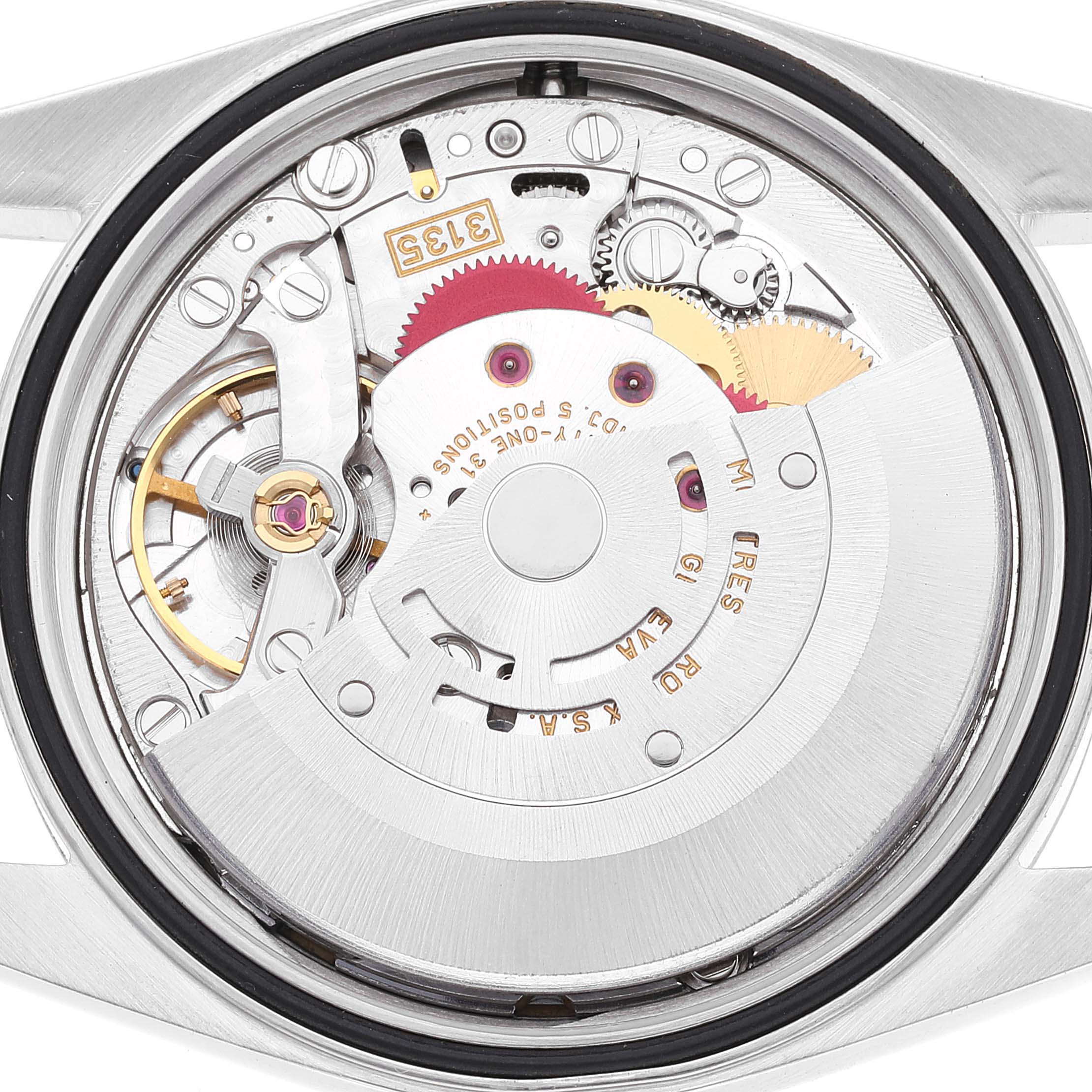 The image shows a close-up view of the movement inside a Rolex Datejust 16220 Men's Stainless Steel Blue Dial 16220 Men's Stainless Steel Blue Dial watch.