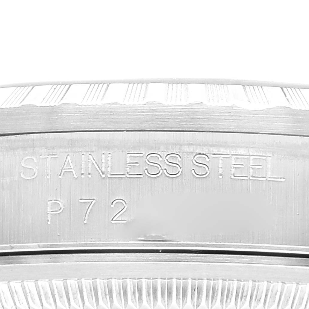 This image shows a close-up of the case back of a Rolex Datejust 16220 Men's Stainless Steel Blue Dial 16220 Men's Stainless Steel Blue Dial model, highlighting the stainless steel engraving.