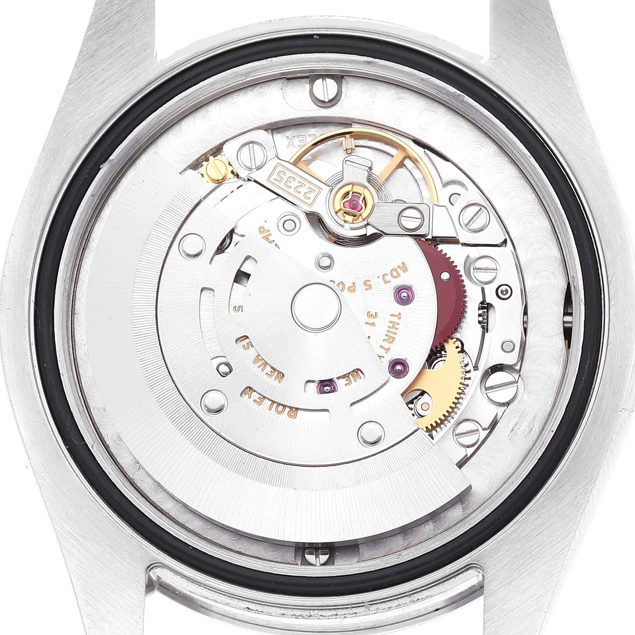 The image shows the exposed internal mechanism of a Rolex Mid-Size 178240 Women
s Stainless Steel White Dial 178240 Women
s Stainless Steel White Dial watch from a top-down angle.
