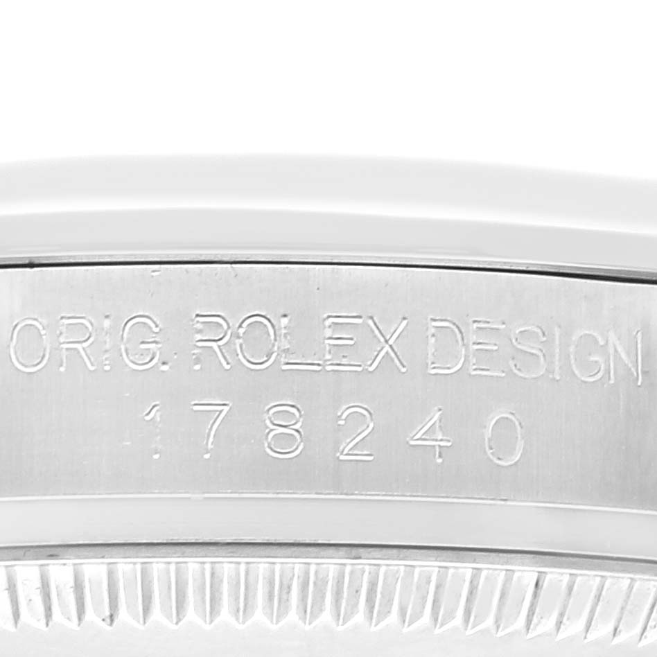 The image shows a close-up of the side engraving on a Rolex Mid-Size 178240 Women
s Stainless Steel White Dial 178240 Women
s Stainless Steel White Dial model 178240 watch, featuring "ORIG. ROLEX DESIGN" and the model number.