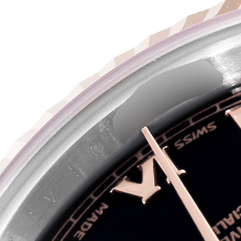 The image shows a close-up of the Rolex Datejust 179171 Women's Steel and Gold (two tone) Black Dial 179171 Women's Steel and Gold (two tone) Black Dial watch, focusing on the dial and a portion of the bezel.