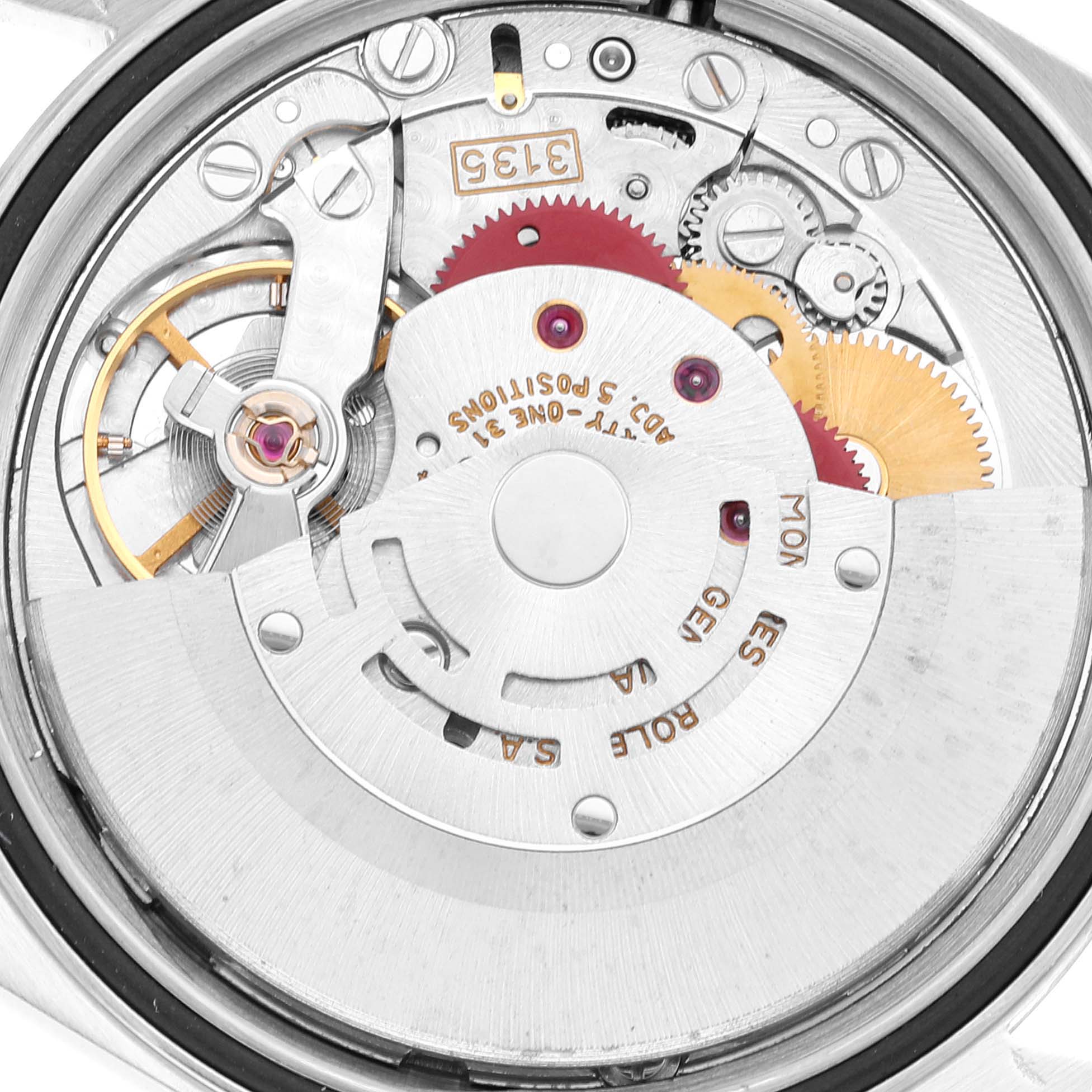 This image shows the internal mechanism of a Rolex Datejust 16234 Men's Stainless Steel Silver Dial 16234 Men's Stainless Steel Silver Dial watch from a top-down angle, highlighting its intricate gears and components.
