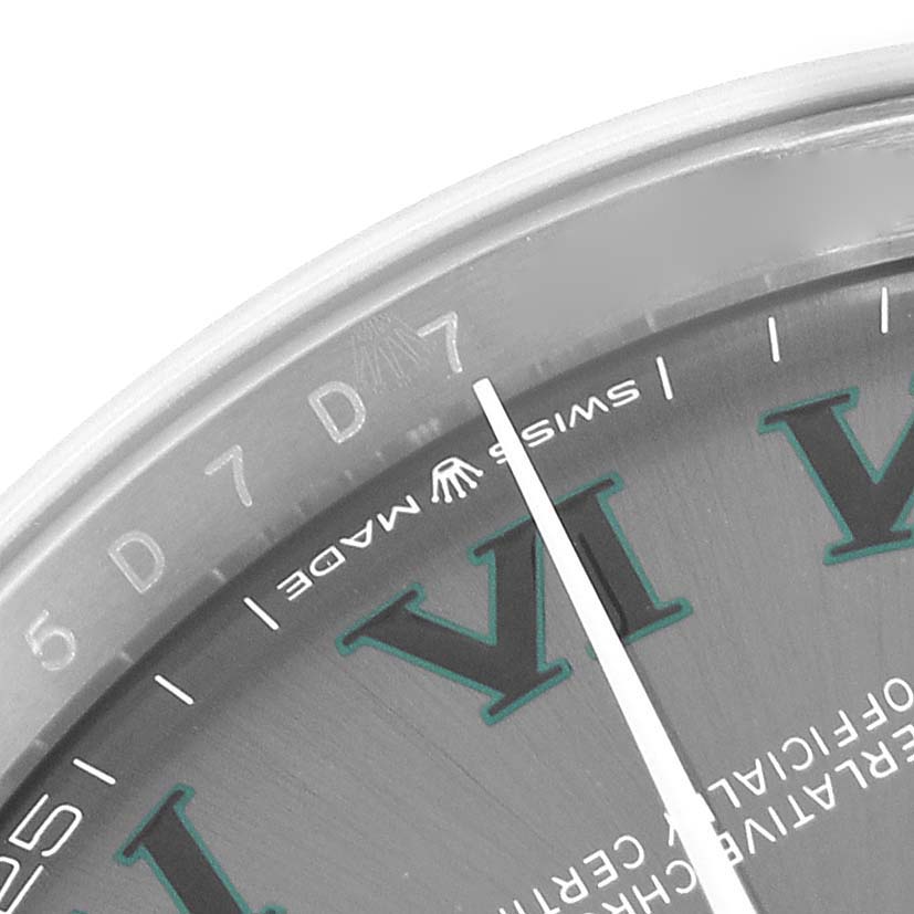 This close-up image of the Rolex Datejust 126234 Men's Stainless Steel Grey Dial 126234 Men's Stainless Steel Grey Dial watch shows part of the dial, Roman numerals, and the "SWISS MADE" inscription.