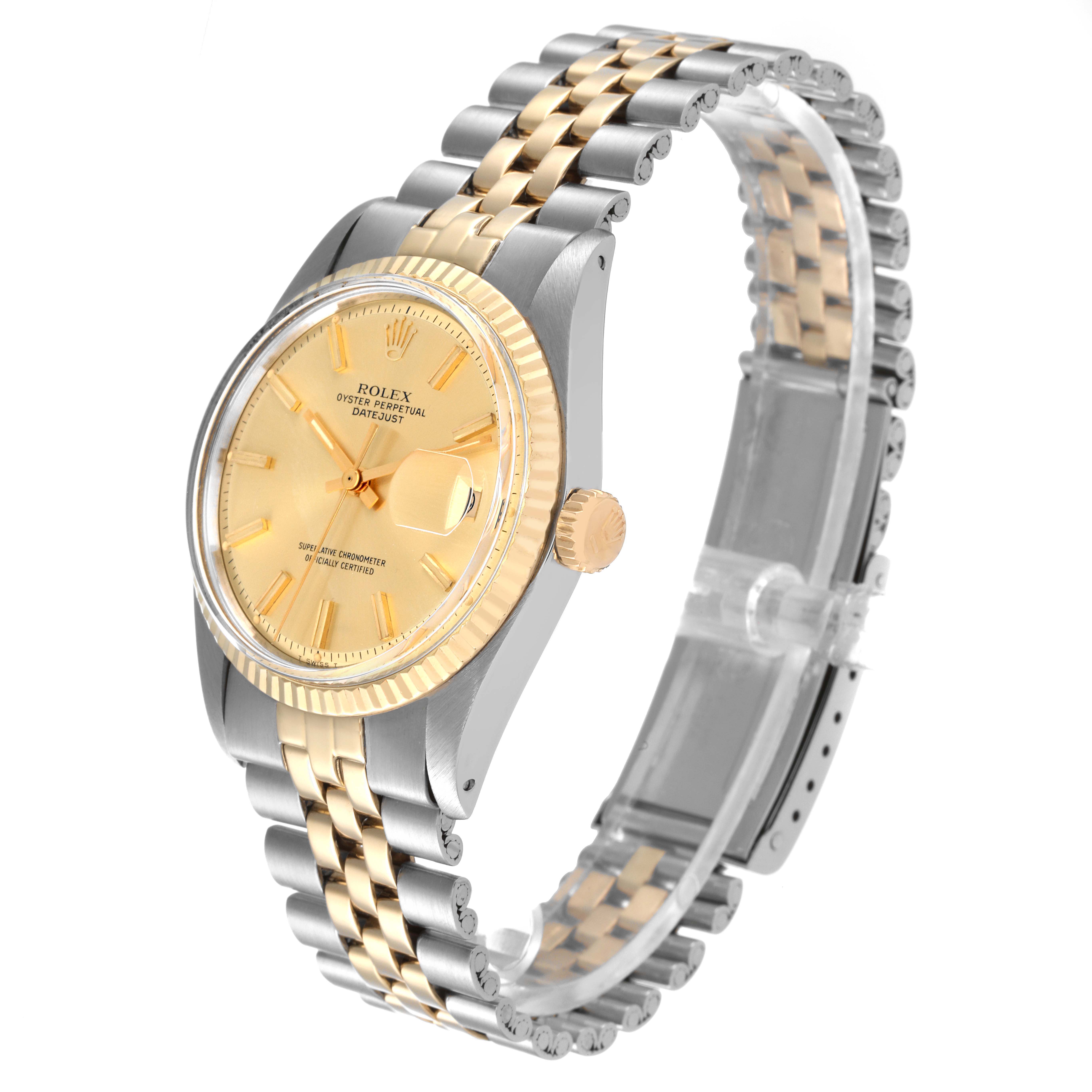 This image shows a side view of the Rolex Vintage Collection 1601 Men's Steel and Gold (two tone) Champagne Dial 1601 Men's Steel and Gold (two tone) Champagne Dial model, highlighting its dial, crown, and bracelet.