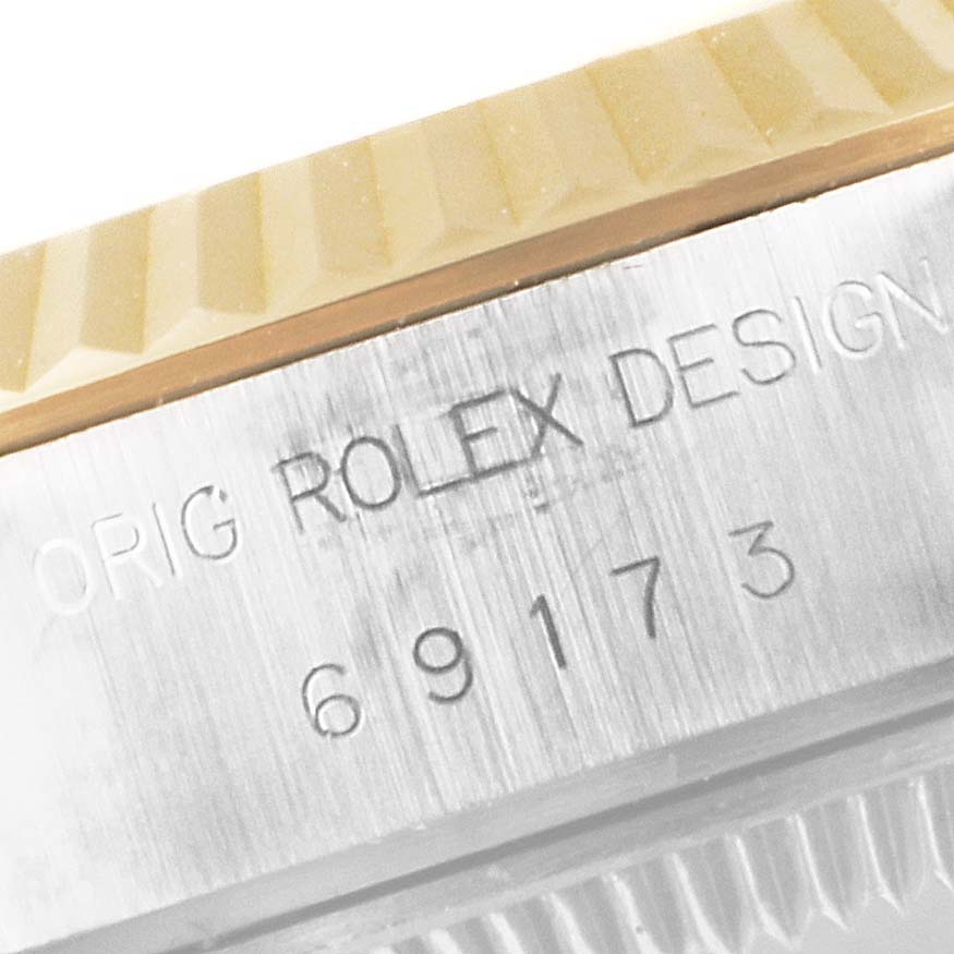 The image shows a close-up of the caseback and fluted bezel of a Rolex Datejust 69173 Women's Steel and Gold (two tone) White Dial 69173 Women's Steel and Gold (two tone) White Dial, revealing the model number "69173."