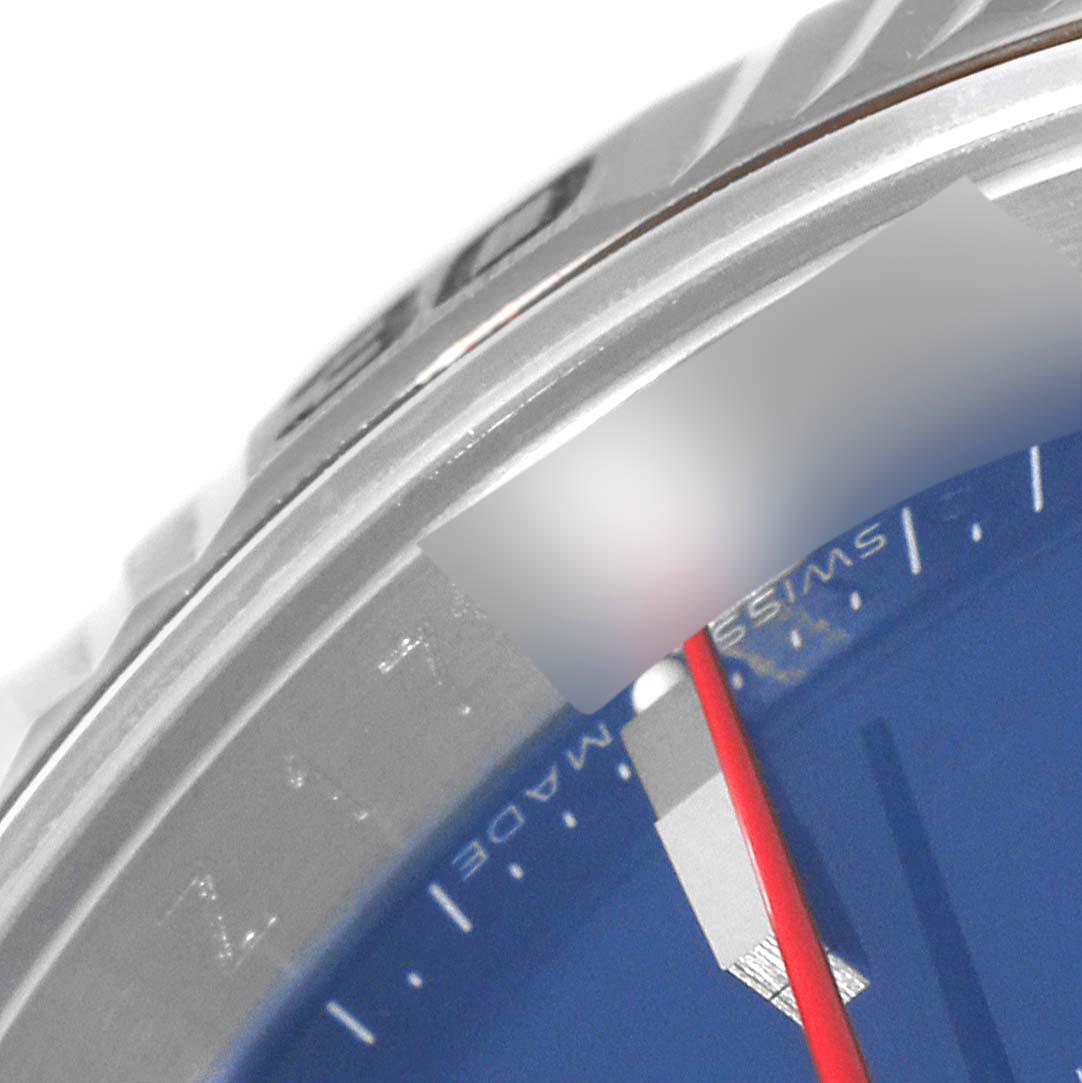 This close-up image of a Rolex Turn-o-Graph 116264 Men's Stainless Steel Blue Dial 116264 Men's Stainless Steel Blue Dial watch shows part of the bezel, crystal, and dial with a "SWISS" marking.