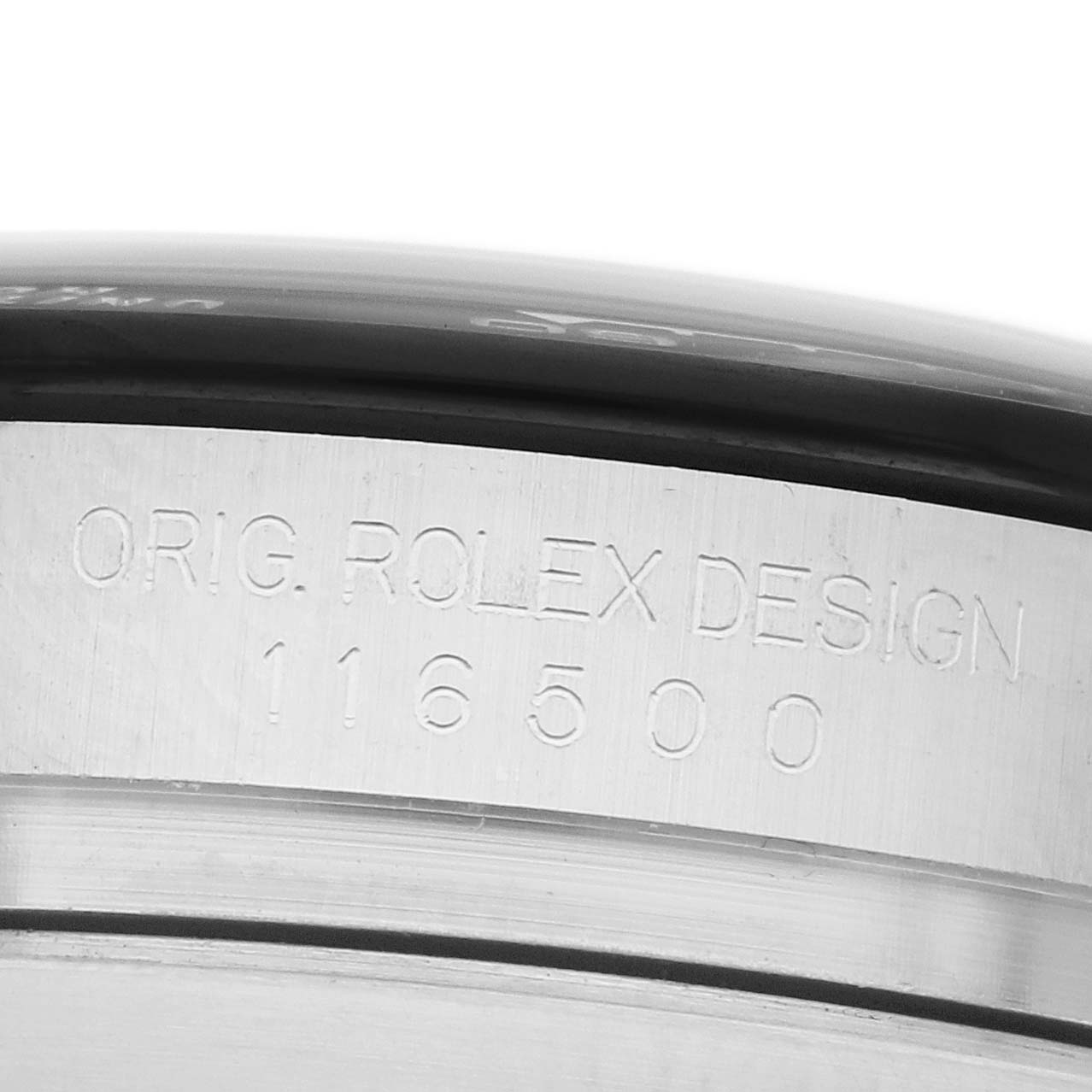 The image shows a close-up of the side engraving on a Rolex Daytona 116500 Men
s Stainless Steel Black Dial watch, displaying "ORIG. ROLEX DESIGN" and model number "116500".