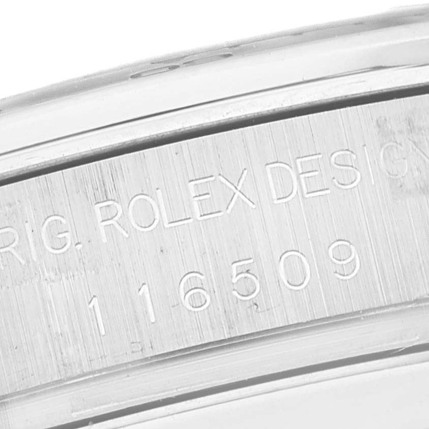 This close-up photo shows the engraved model number on the side of the casing for a Rolex Daytona 116509 Men's White Gold Blue Dial 116509 Men's White Gold Blue Dial watch.
