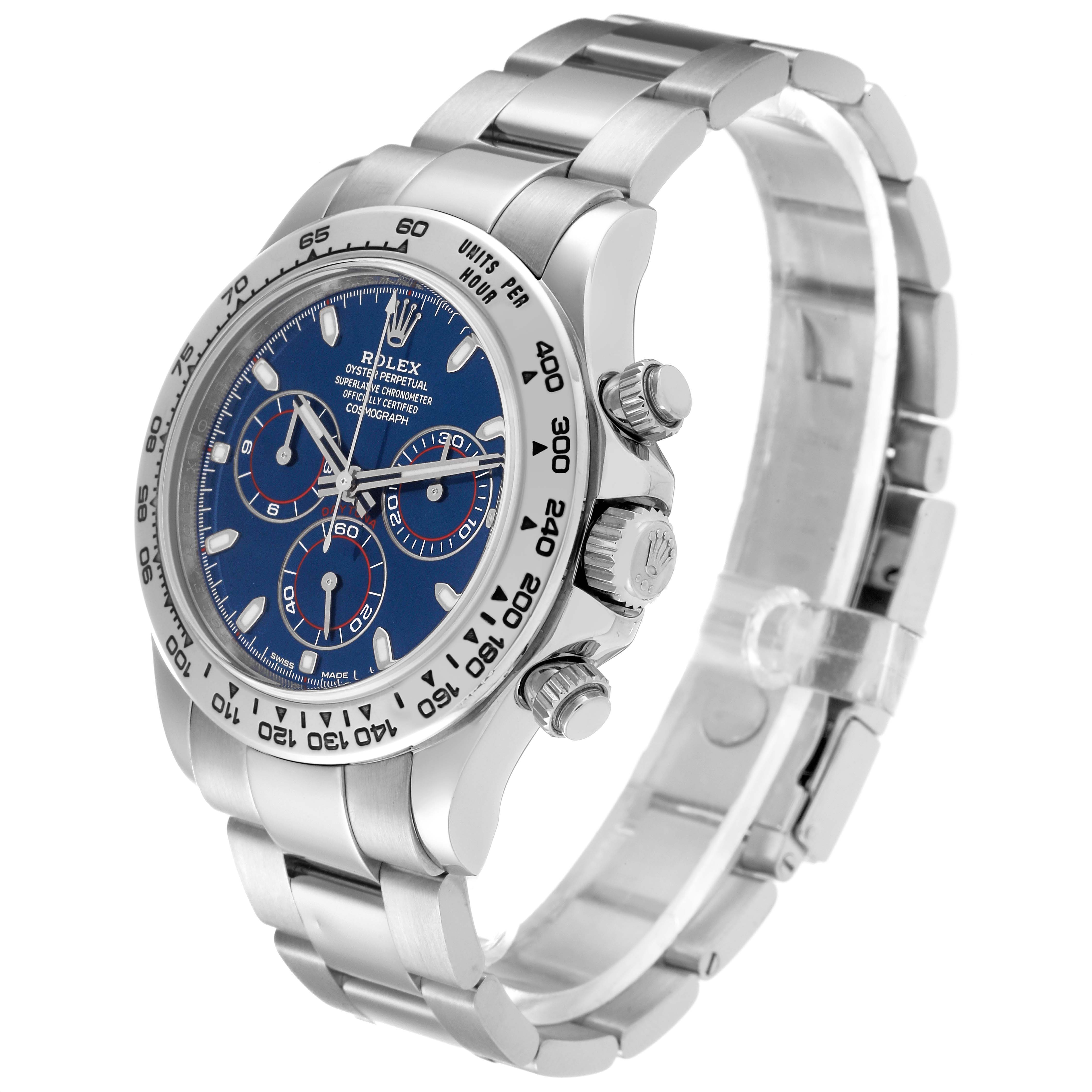 The Rolex Daytona 116509 Men's White Gold Blue Dial 116509 Men's White Gold Blue Dial watch is displayed at a three-quarter angle, showcasing the face, bezel, crown, and bracelet.