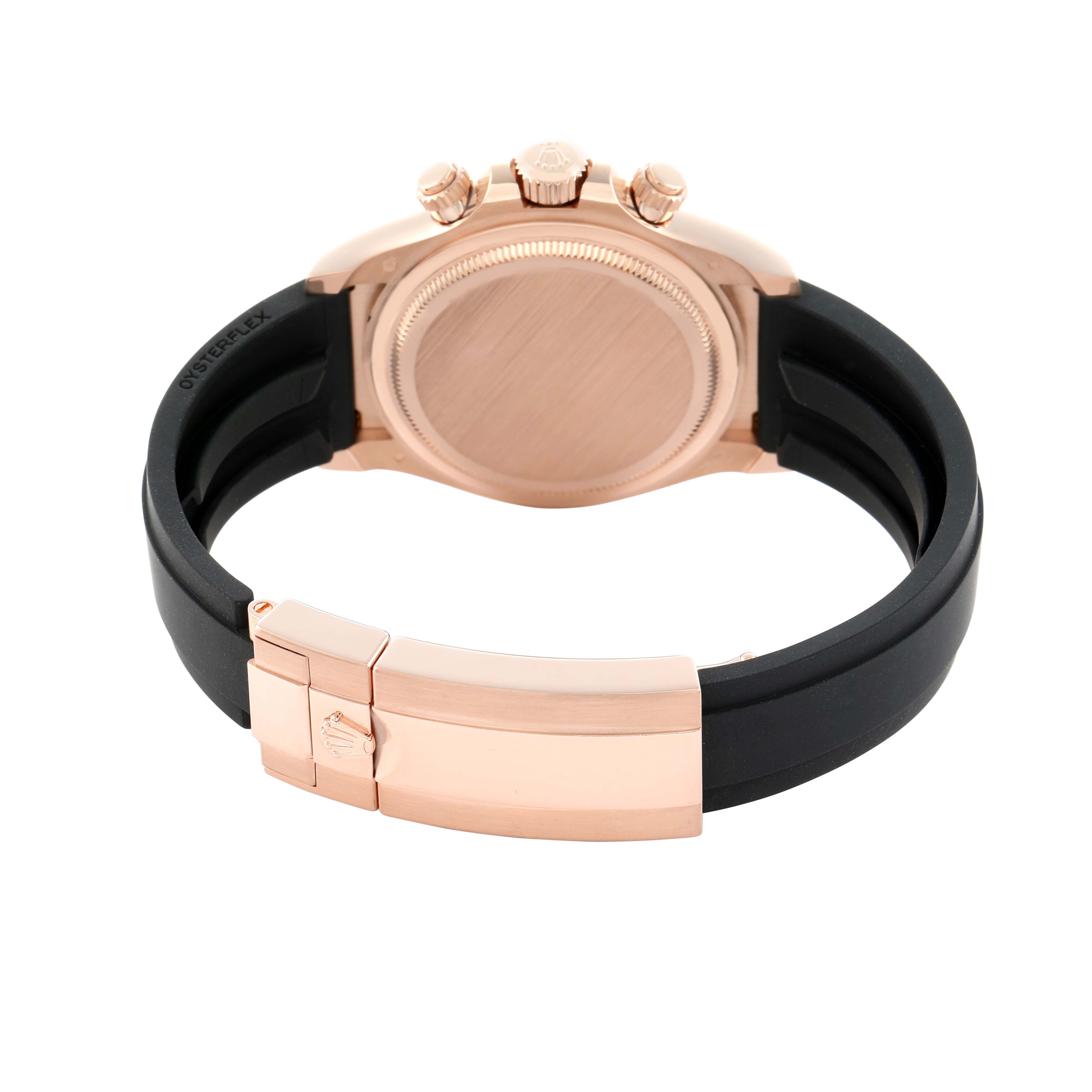 The Rolex Daytona 126515 Men
s Rose Gold Black Dial watch is shown from the back, highlighting the case, crown, pushers, and Oysterflex strap.