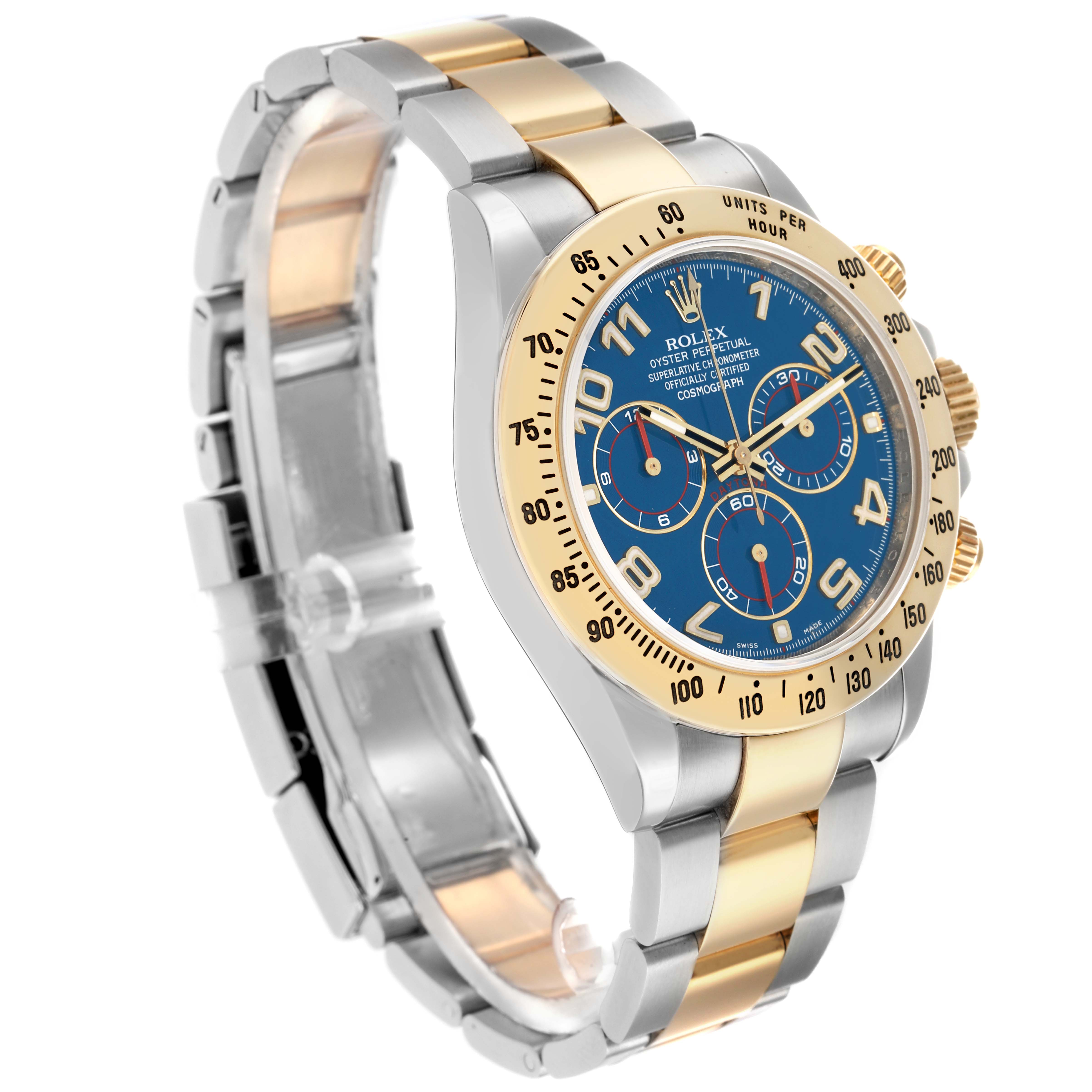 The image shows the Rolex Daytona 116523 Men
s Steel and Gold (two tone) Blue Dial watch at an angled side view, highlighting the bezel, dial, case, and bracelet.