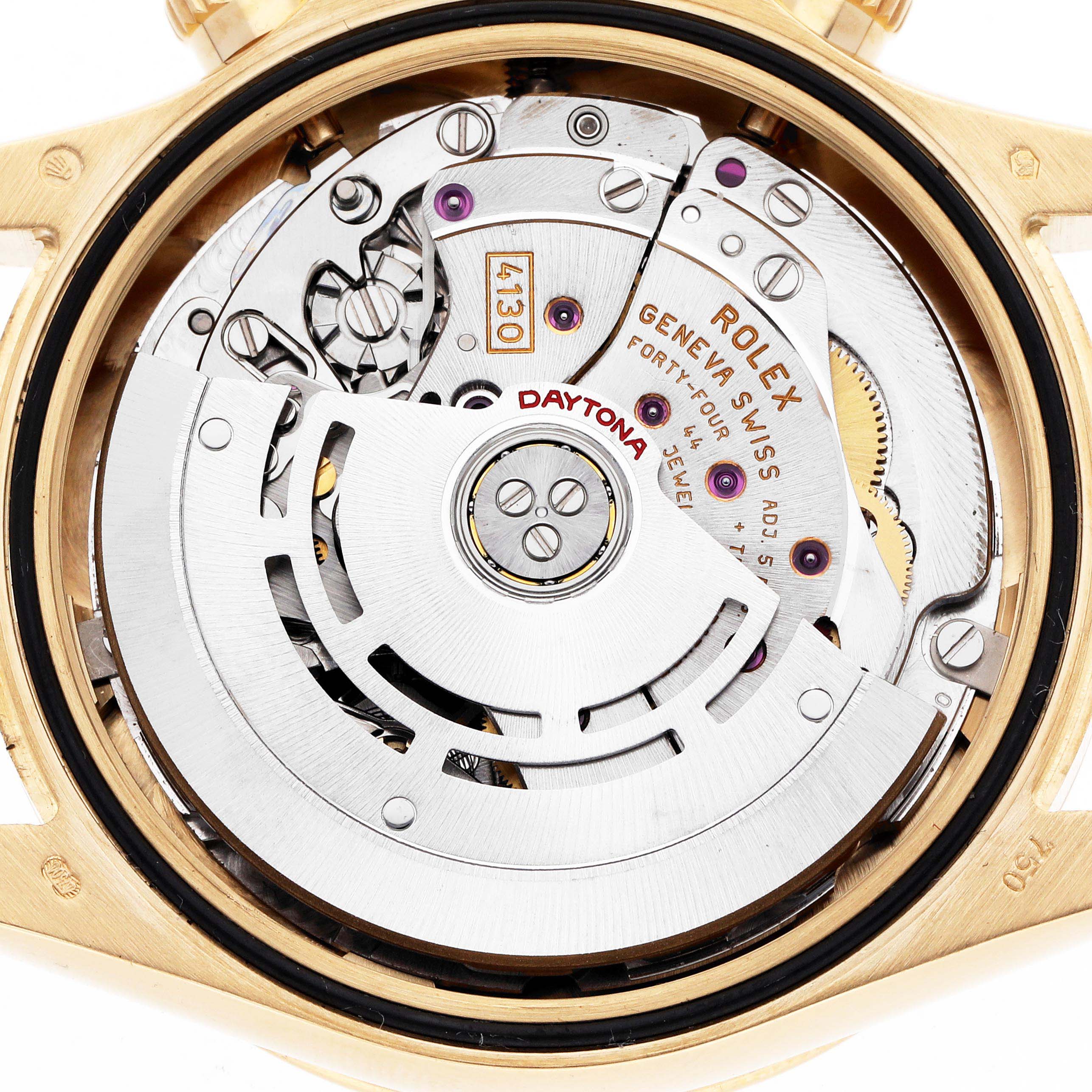 The image shows the movement of a Rolex Daytona 116528 Men
s Yellow Gold Silver Dial watch from a top-down angle, highlighting its intricate internal components.