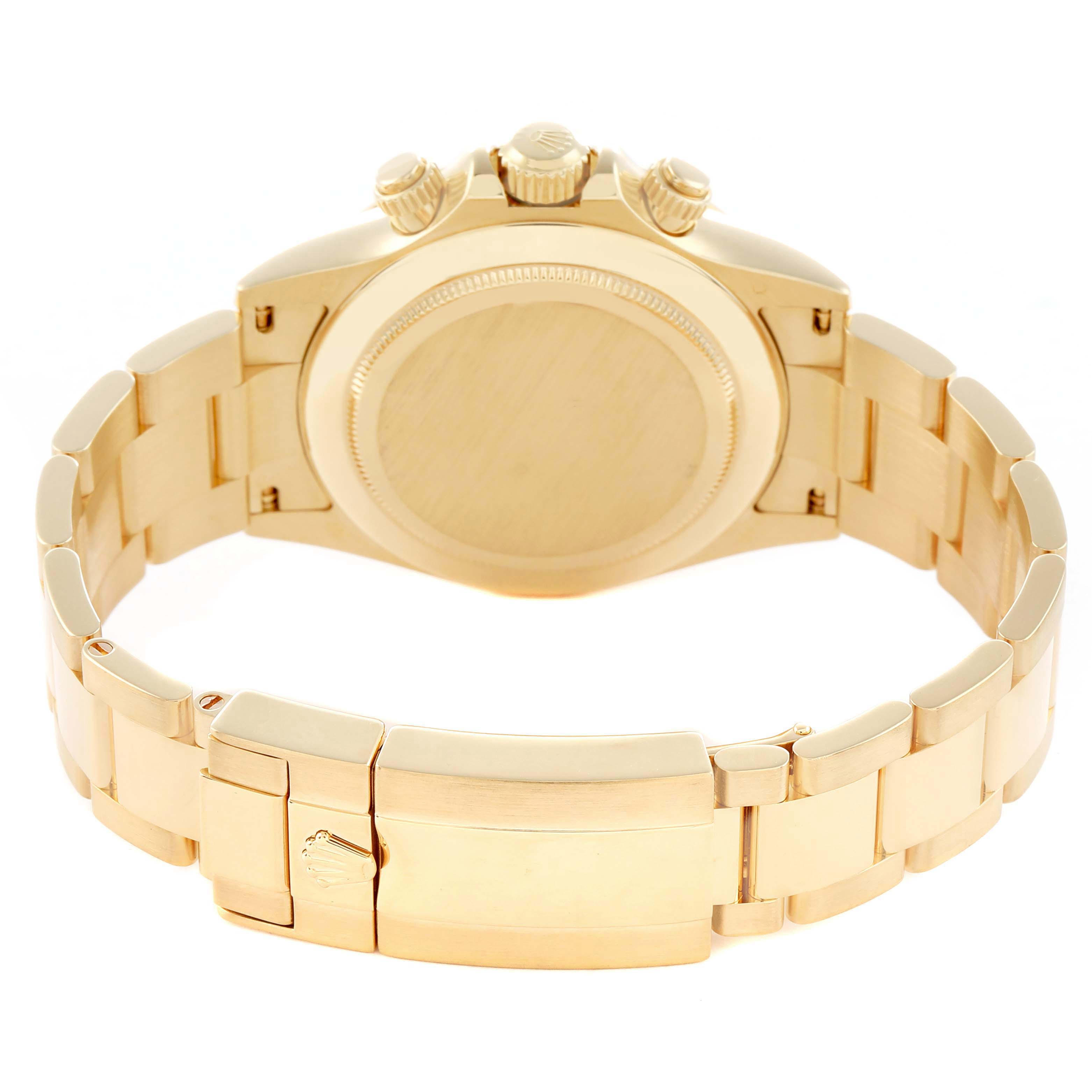 The image shows the back view of a Rolex Daytona 116528 Men
s Yellow Gold Silver Dial, highlighting the case back, bracelet, and clasp.