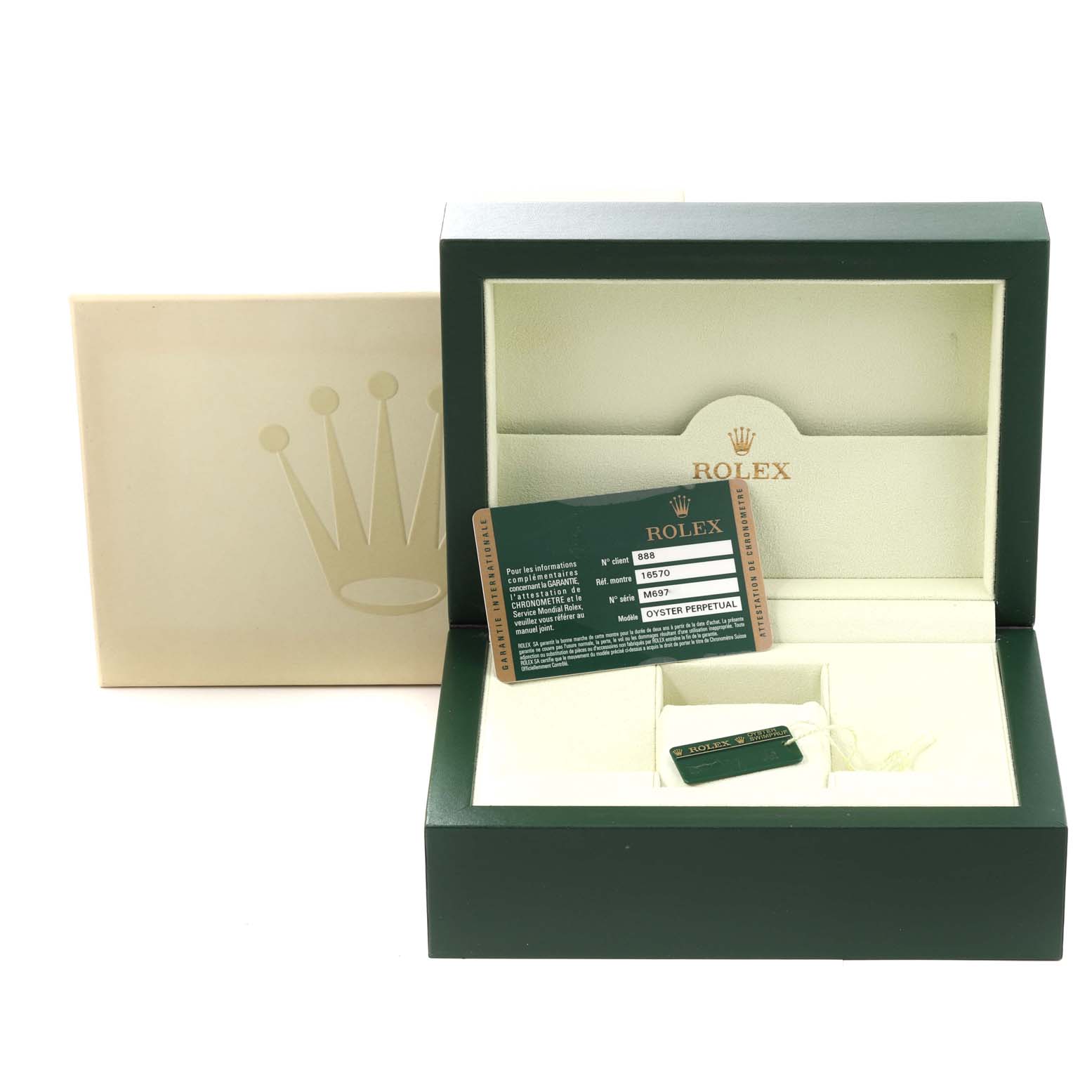 This image shows the packaging of a Rolex Explorer 16570 Men
s Stainless Steel White Dial 16570 Men
s Stainless Steel White Dial model, including its box, booklet, and tags.