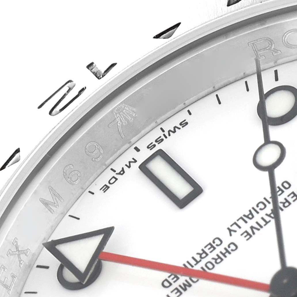 The image shows a close-up of the dial, bezel, and hands of a Rolex Explorer 16570 Men
s Stainless Steel White Dial 16570 Men
s Stainless Steel White Dial watch.