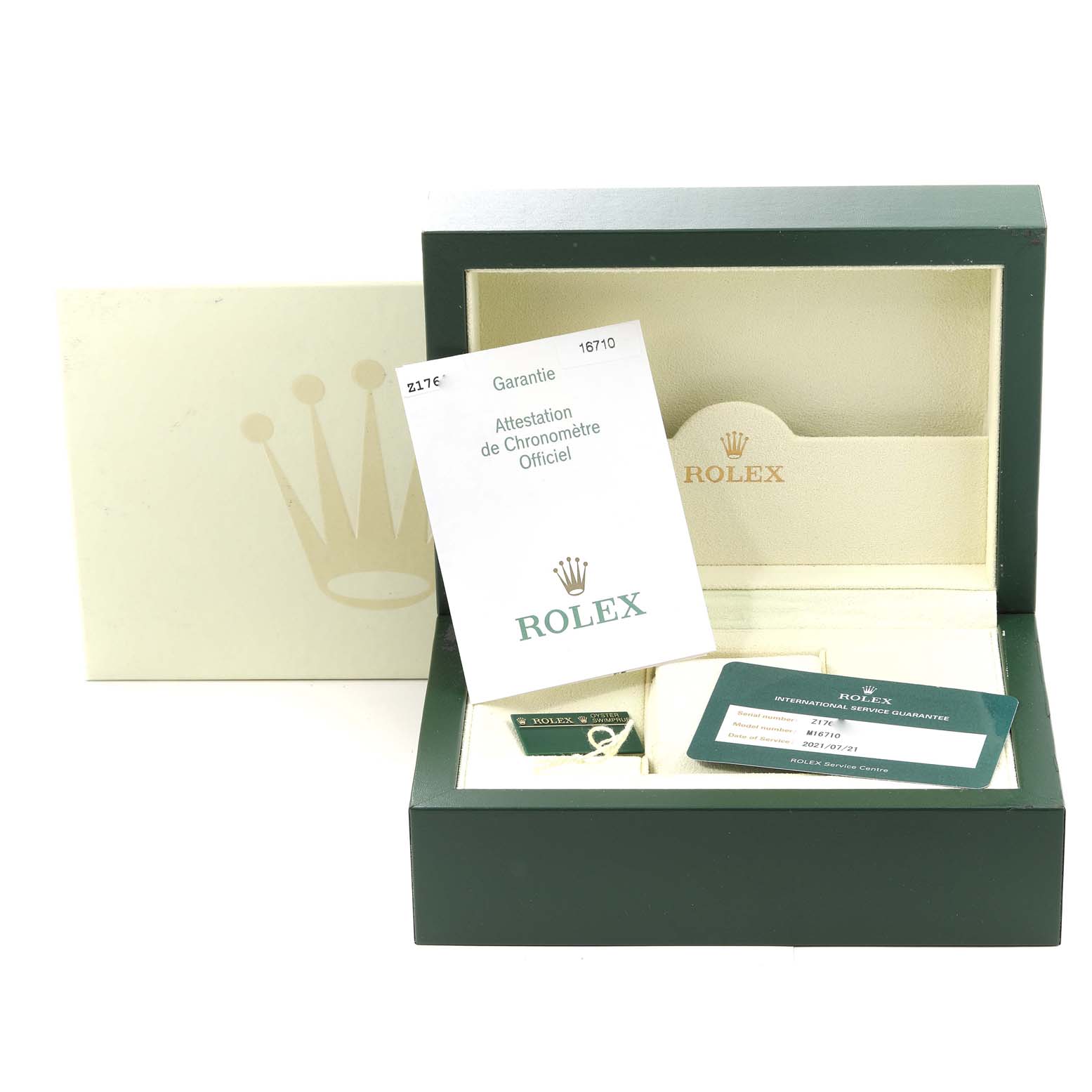 The image shows the packaging box, booklet, and warranty card for a Rolex GMT-Master 16710 Men's Stainless Steel Black Dial 16710 Men's Stainless Steel Black Dial watch, displayed at an angle revealing the inside contents.