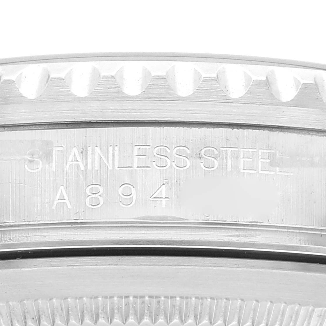 This image shows a close-up of the stainless steel case back and model number of a Rolex GMT-Master 16710 Men's Stainless Steel Black Dial 16710 Men's Stainless Steel Black Dial watch.