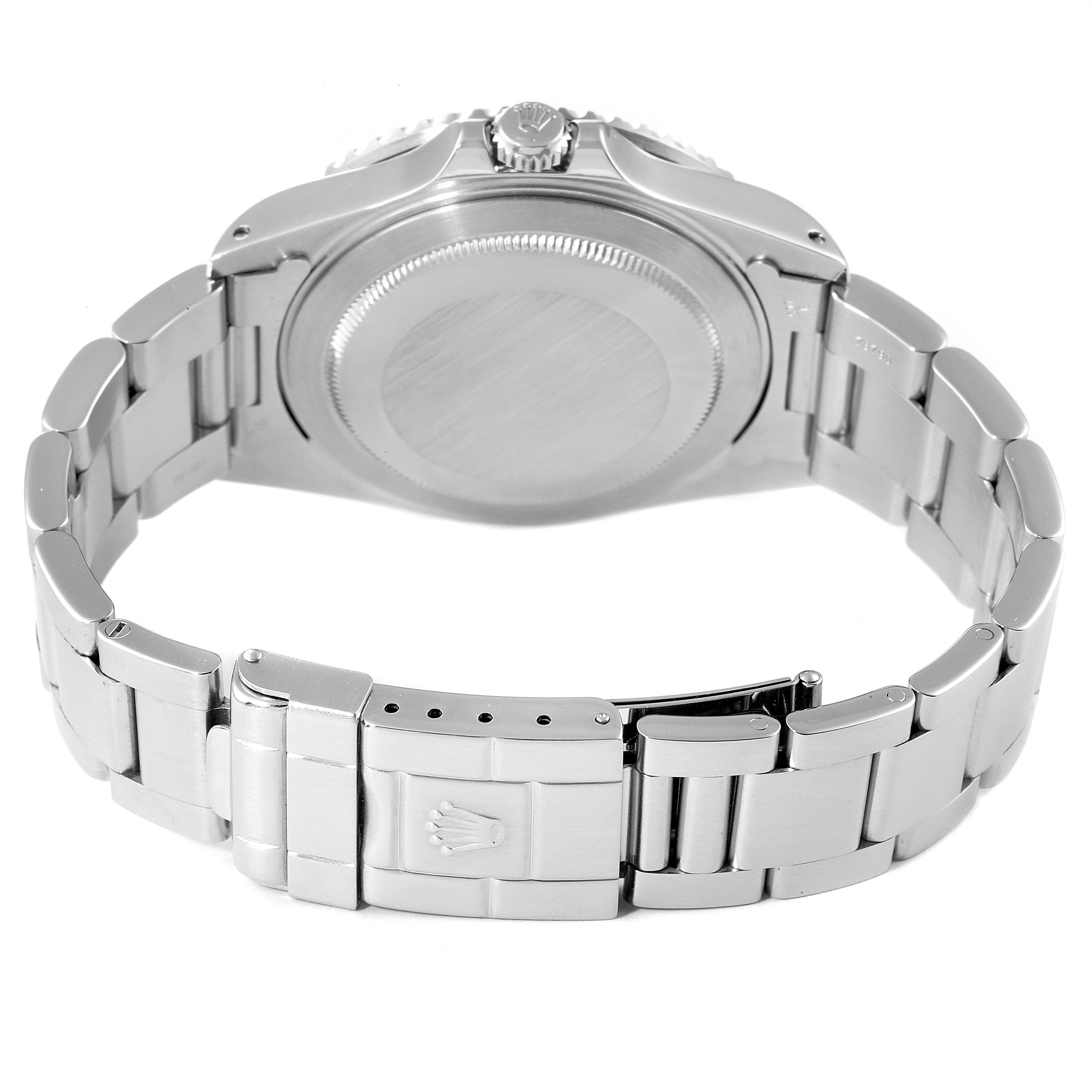 This image shows the rear view of a Rolex GMT-Master 16710 Men
s Stainless Steel Black Dial 16710 Men
s Stainless Steel Black Dial watch, highlighting its case back and bracelet clasp.