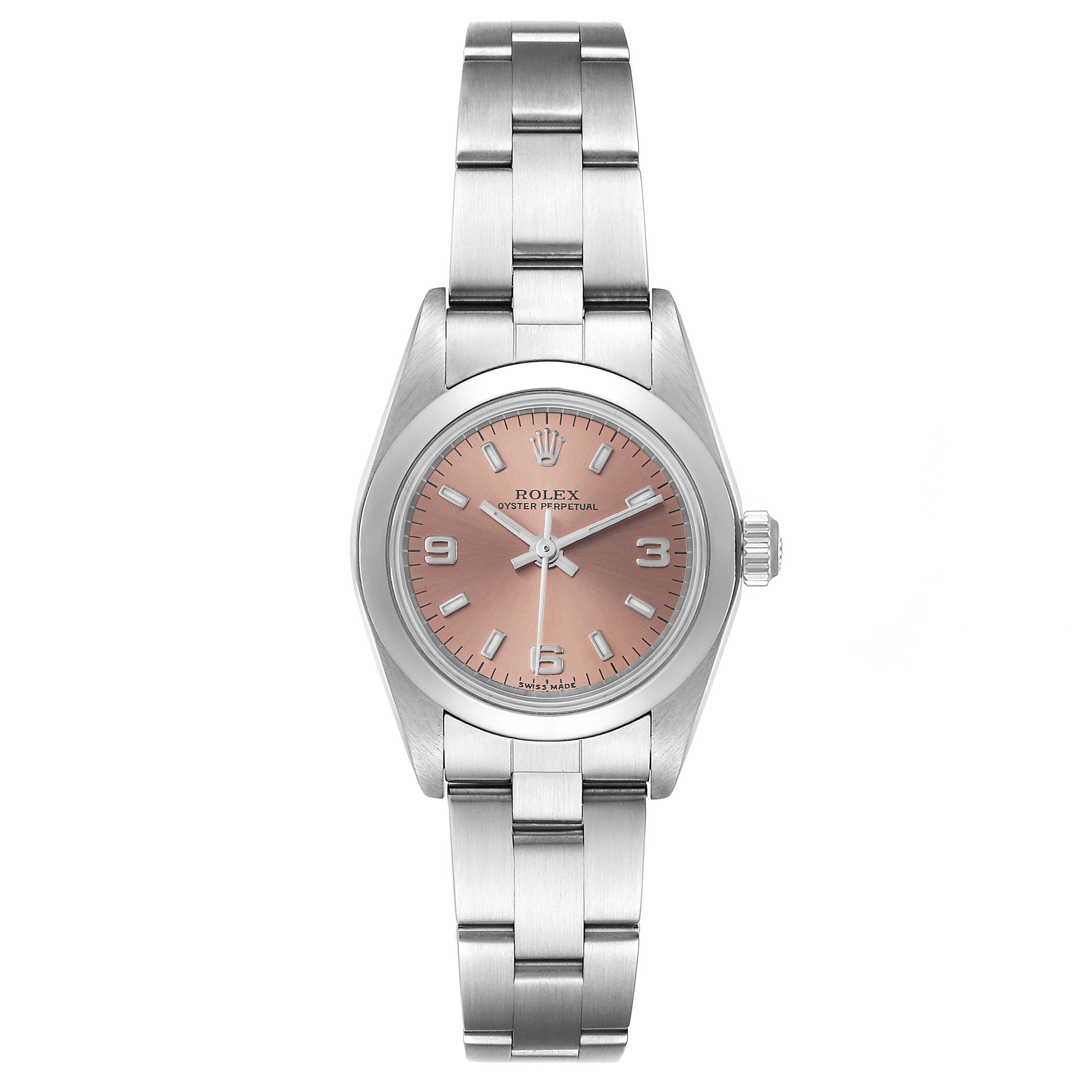 This Rolex Oyster Perpetual 76080 Women
s Stainless Steel Pink Dial 76080 Women
s Stainless Steel Pink Dial watch is shown from a front angle, displaying the face, hour markers, hands, and metal bracelet.