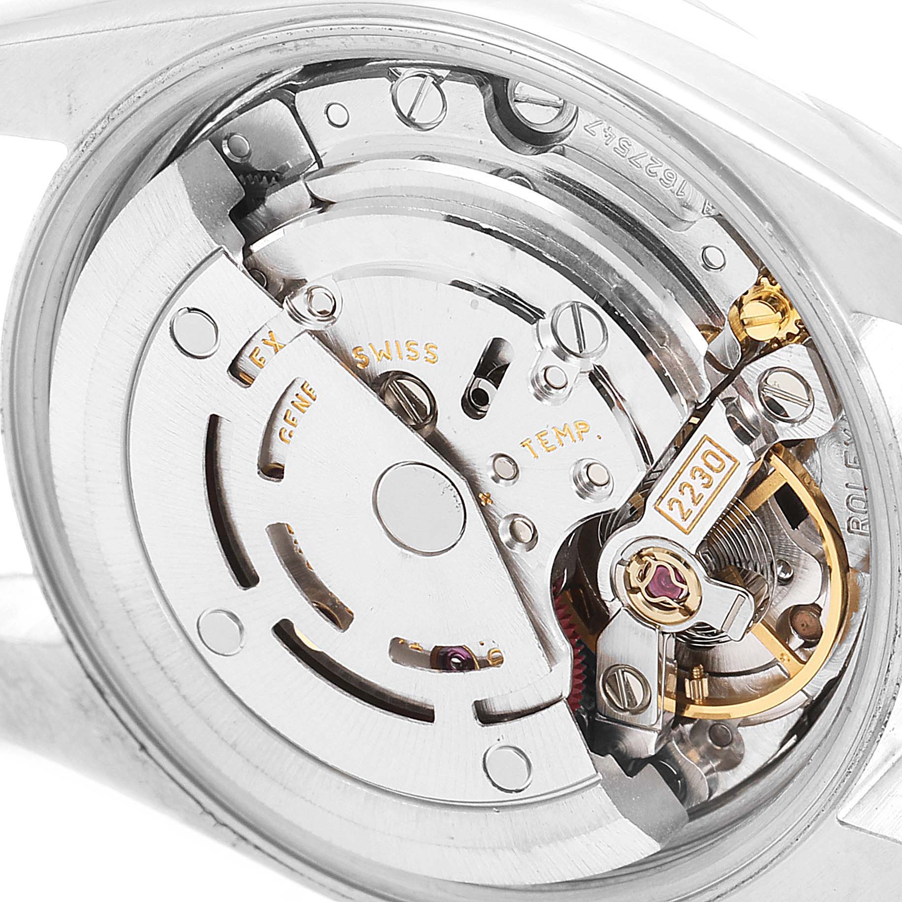 This image shows the inner mechanical movement of a Rolex Oyster Perpetual 76080 Women
s Stainless Steel Pink Dial 76080 Women
s Stainless Steel Pink Dial watch from a close-up, back view angle.