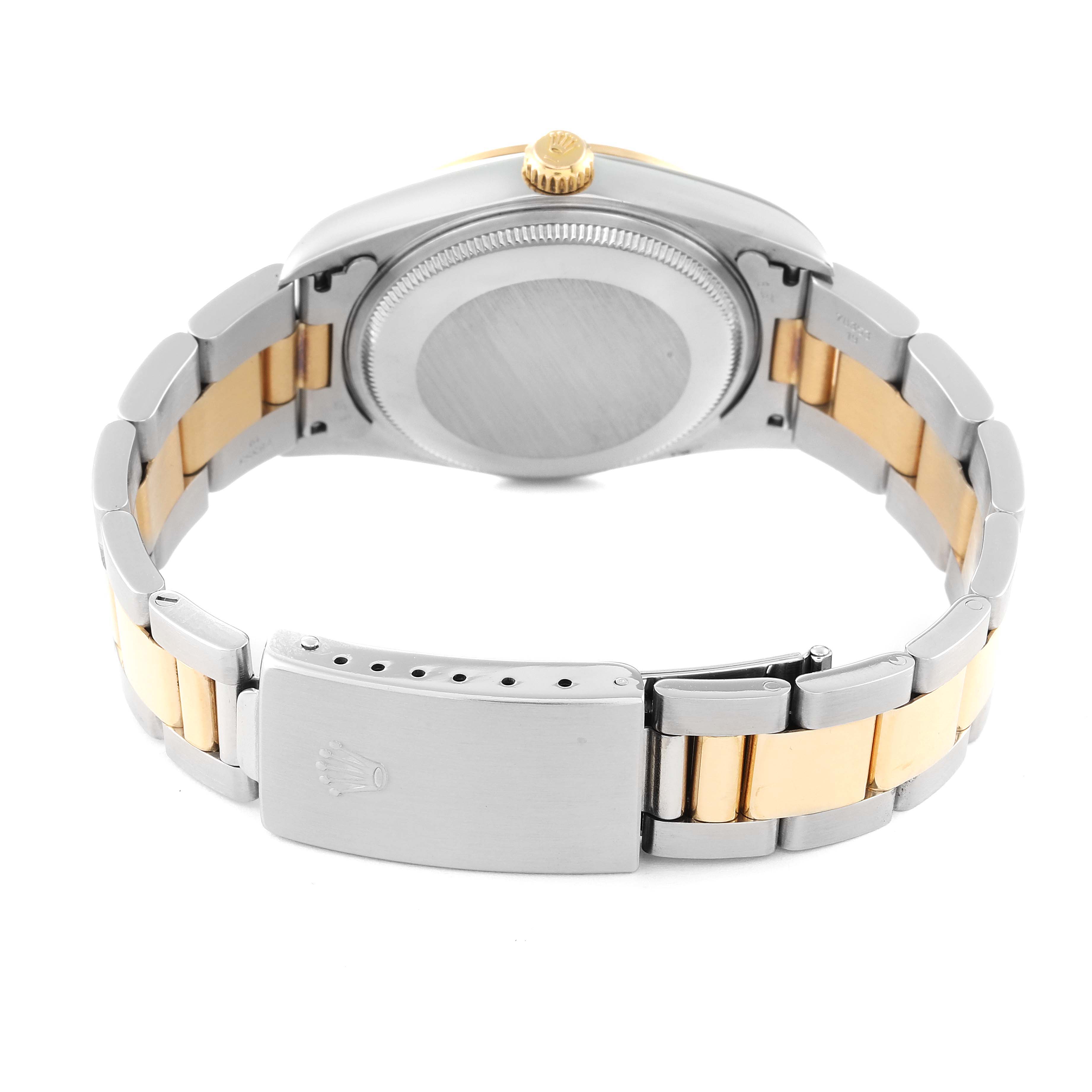 This image shows the back view of the Rolex Oyster Perpetual 14203 Men's Steel and Gold (two tone) Grey Dial 14203 Men's Steel and Gold (two tone) Grey Dial watch, highlighting the case back, crown, and two-tone bracelet with the clasp.