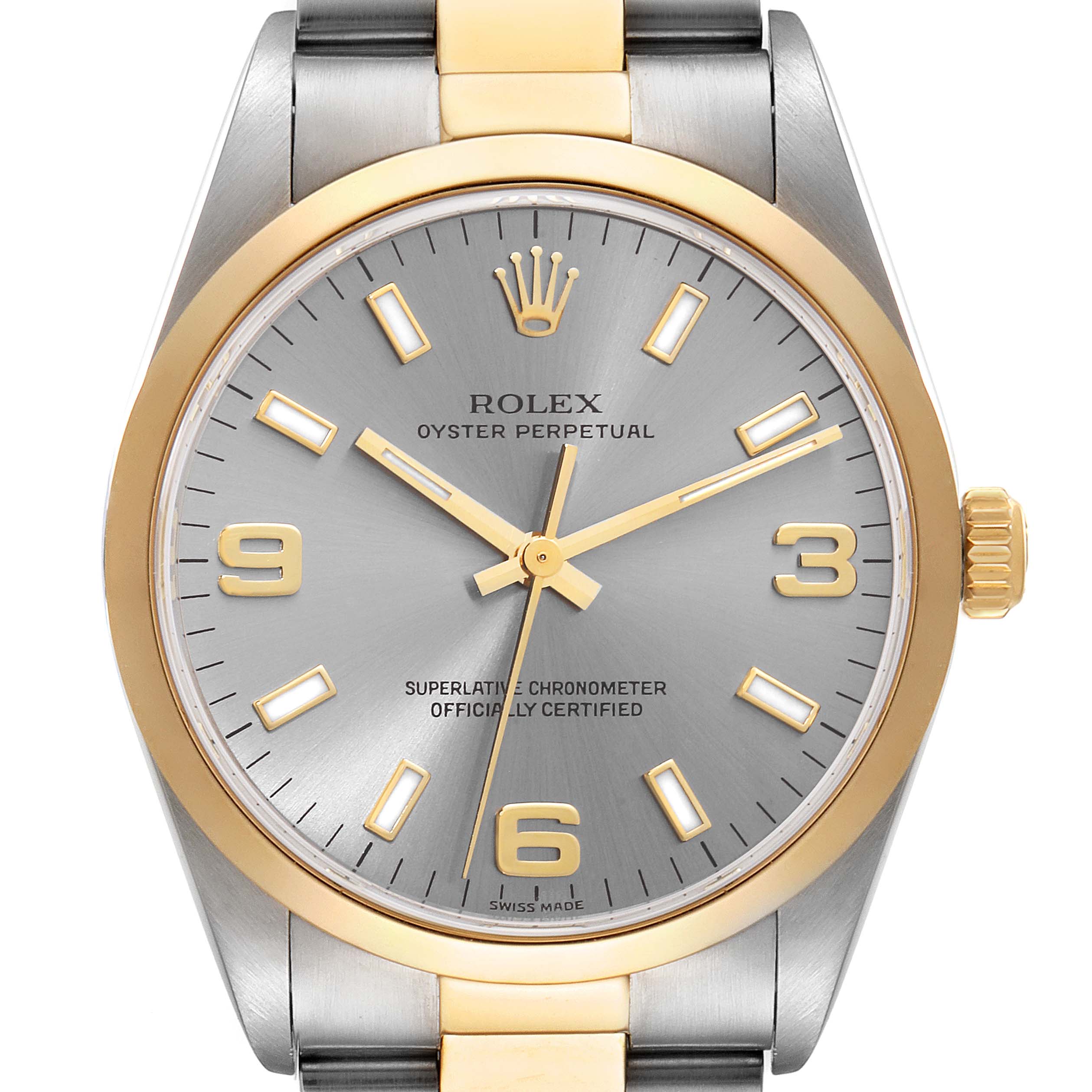 This image shows the front view of a Rolex Oyster Perpetual 14203 Men's Steel and Gold (two tone) Grey Dial 14203 Men's Steel and Gold (two tone) Grey Dial watch featuring a two-tone bezel and silver dial.