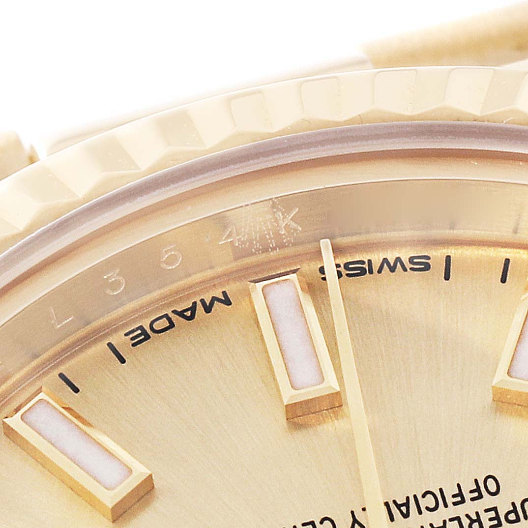 This close-up image shows the dial, markers, and part of the bezel of a Rolex President 279178 Women's Yellow Gold Champagne Dial 279178 Women's Yellow Gold Champagne Dial model watch.