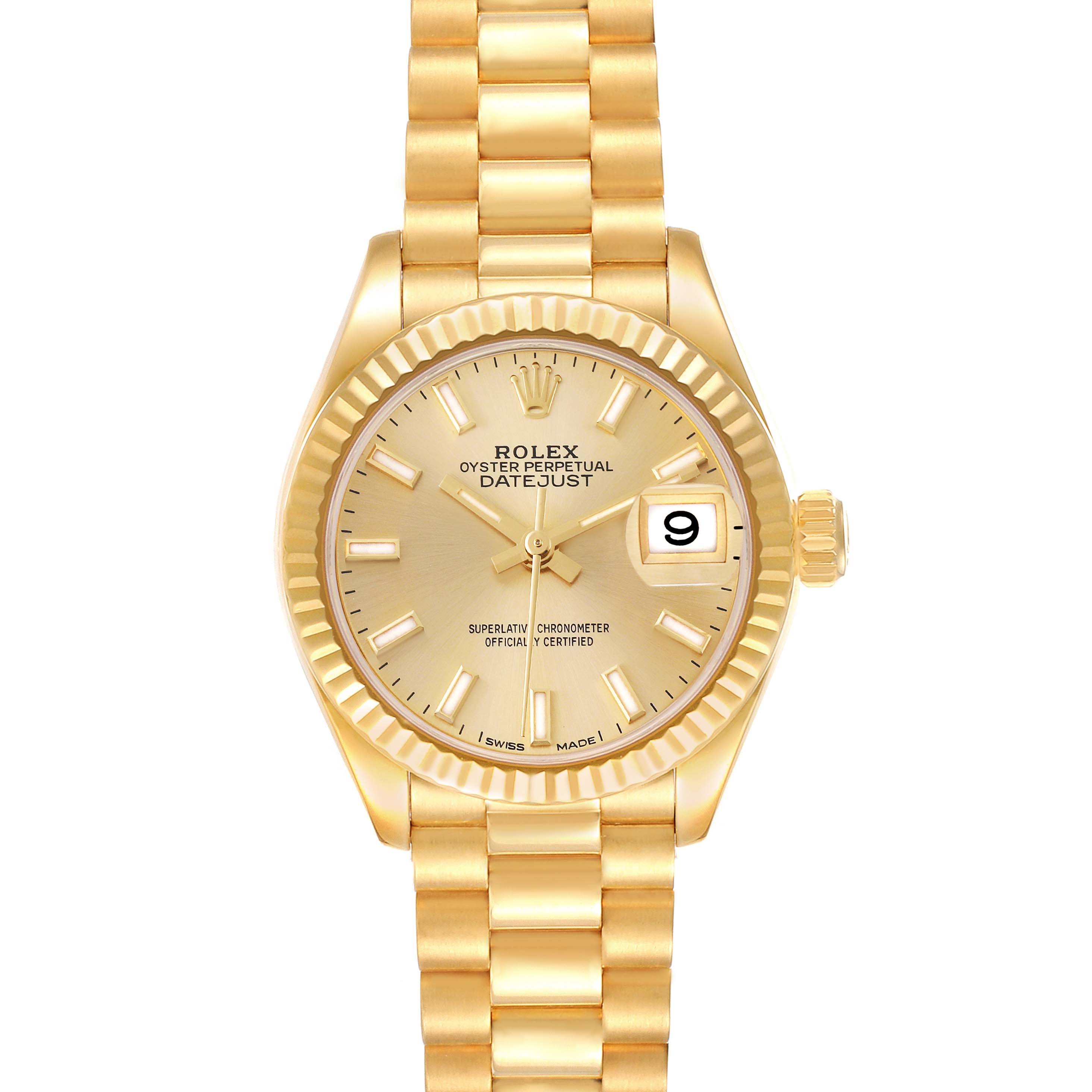 The image shows a front view of the Rolex Datejust President model watch, highlighting its gold band, dial, and date display.