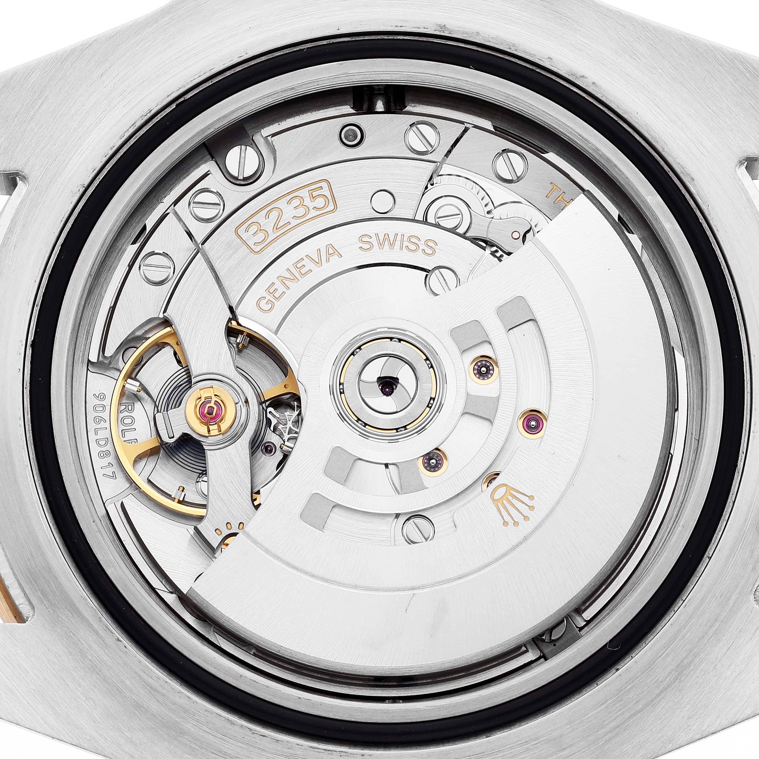 This image shows the intricate mechanical movement of the Rolex Sea-Dweller 126603 Men
s Steel and Gold (two tone) Black Dial 126603 Men
s Steel and Gold (two tone) Black Dial, viewed from the back.