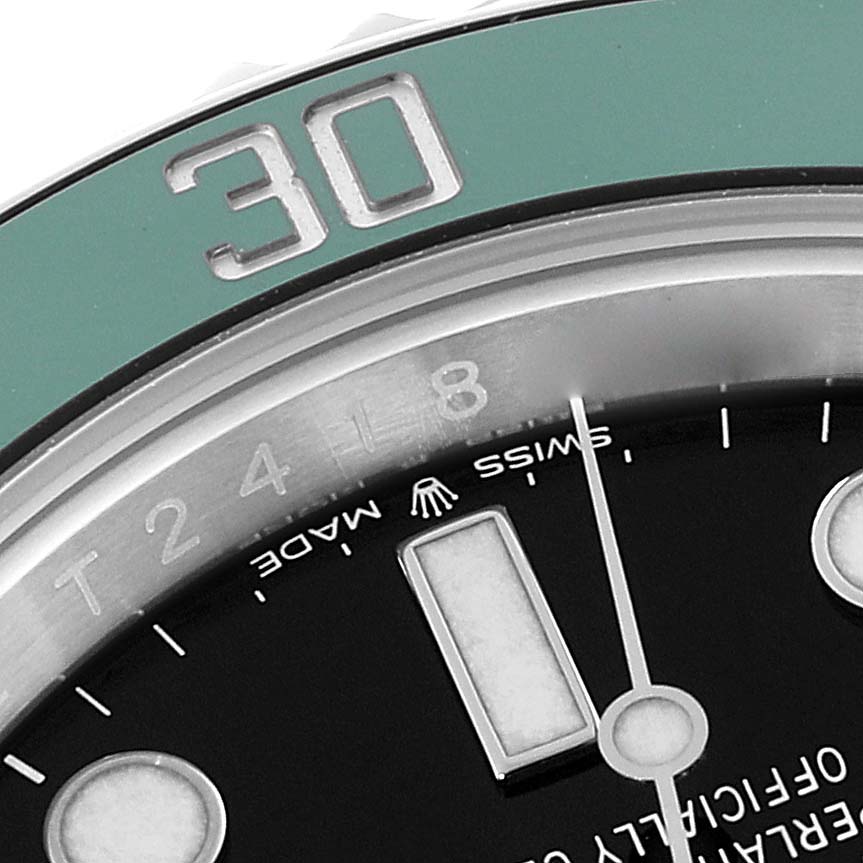 This image shows the angled view of the bezel, part of the dial, and indices of a Rolex Submariner 126610LV Men
s Stainless Steel Black Dial 126610LV Men
s Stainless Steel Black Dial watch.