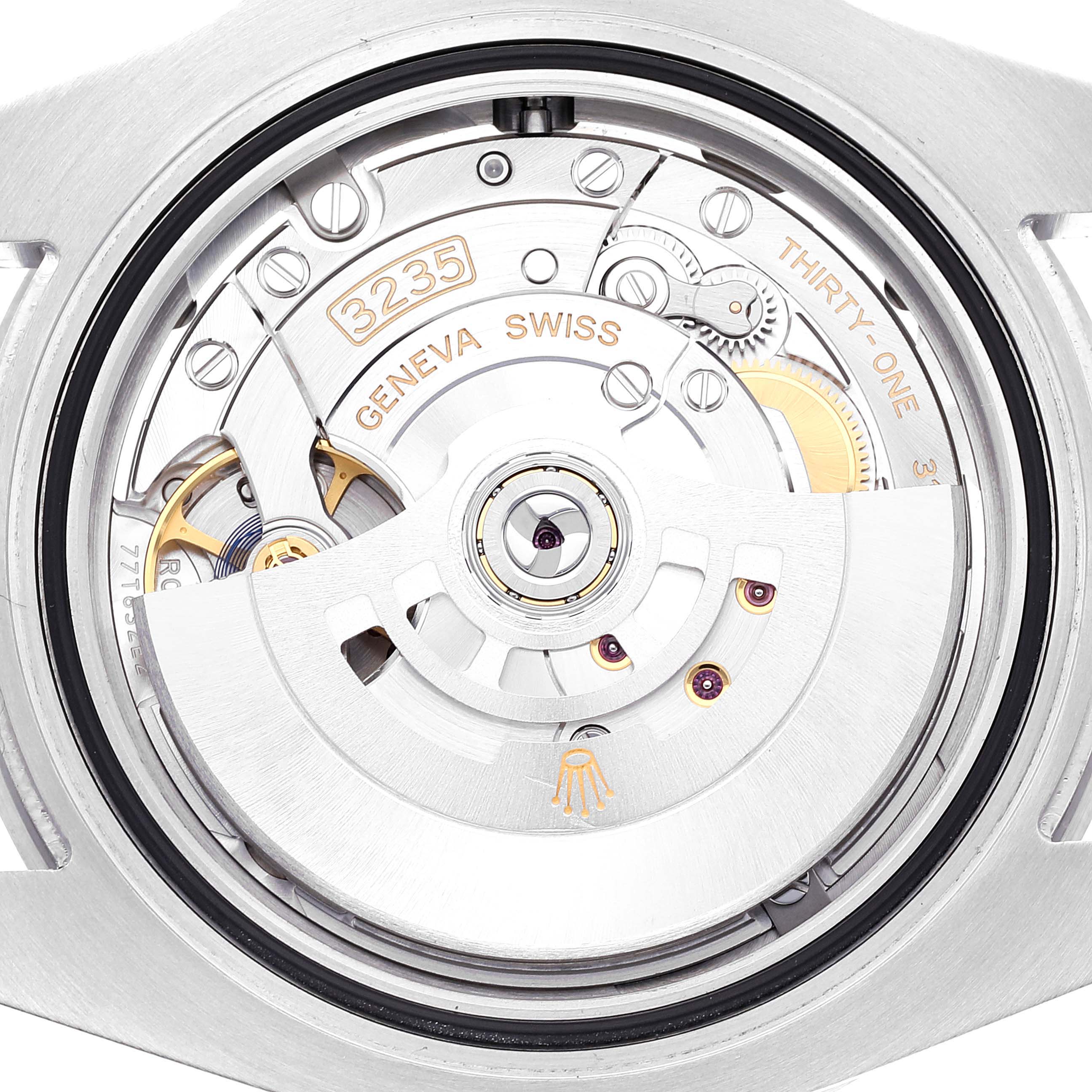 This image shows the back view of the Rolex Submariner 126610LV Men
s Stainless Steel Black Dial 126610LV Men
s Stainless Steel Black Dial watch, specifically the intricate details of its 3235 movement mechanism.