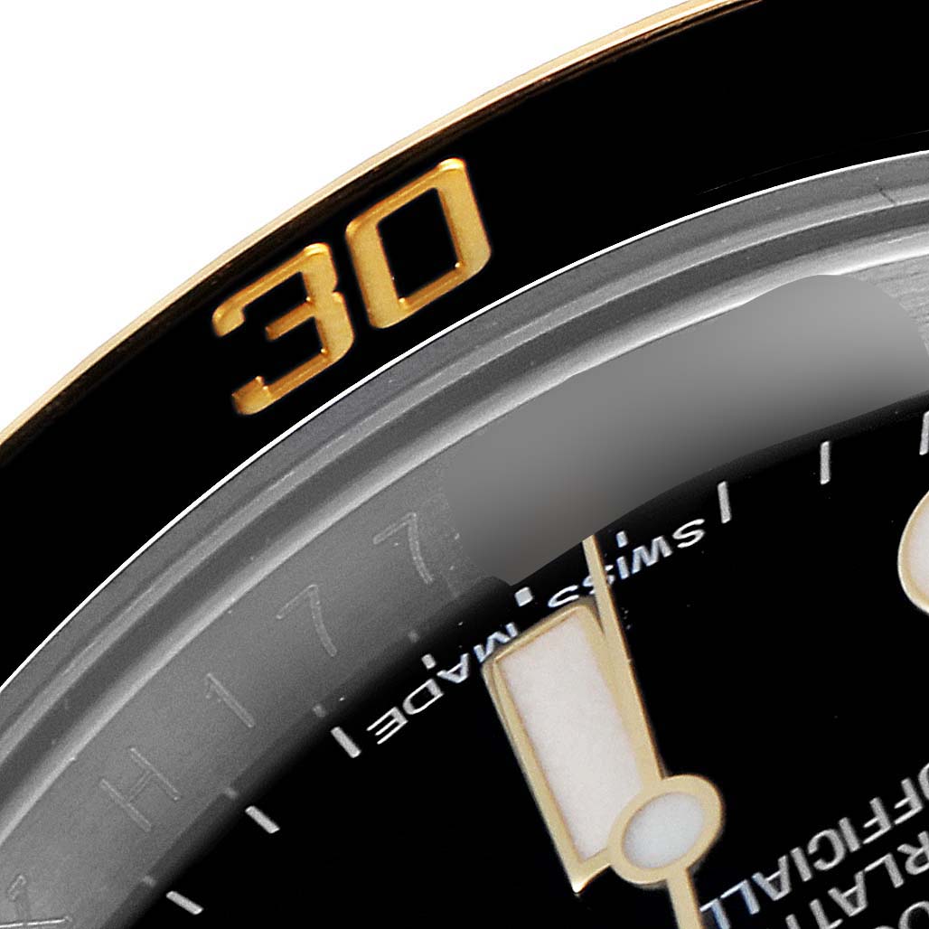 This close-up image shows part of the bezel and dial of a Rolex Submariner 116613 Men's Steel and Gold (two tone) Black Dial 116613 Men's Steel and Gold (two tone) Black Dial watch, highlighting the "30" indicator.