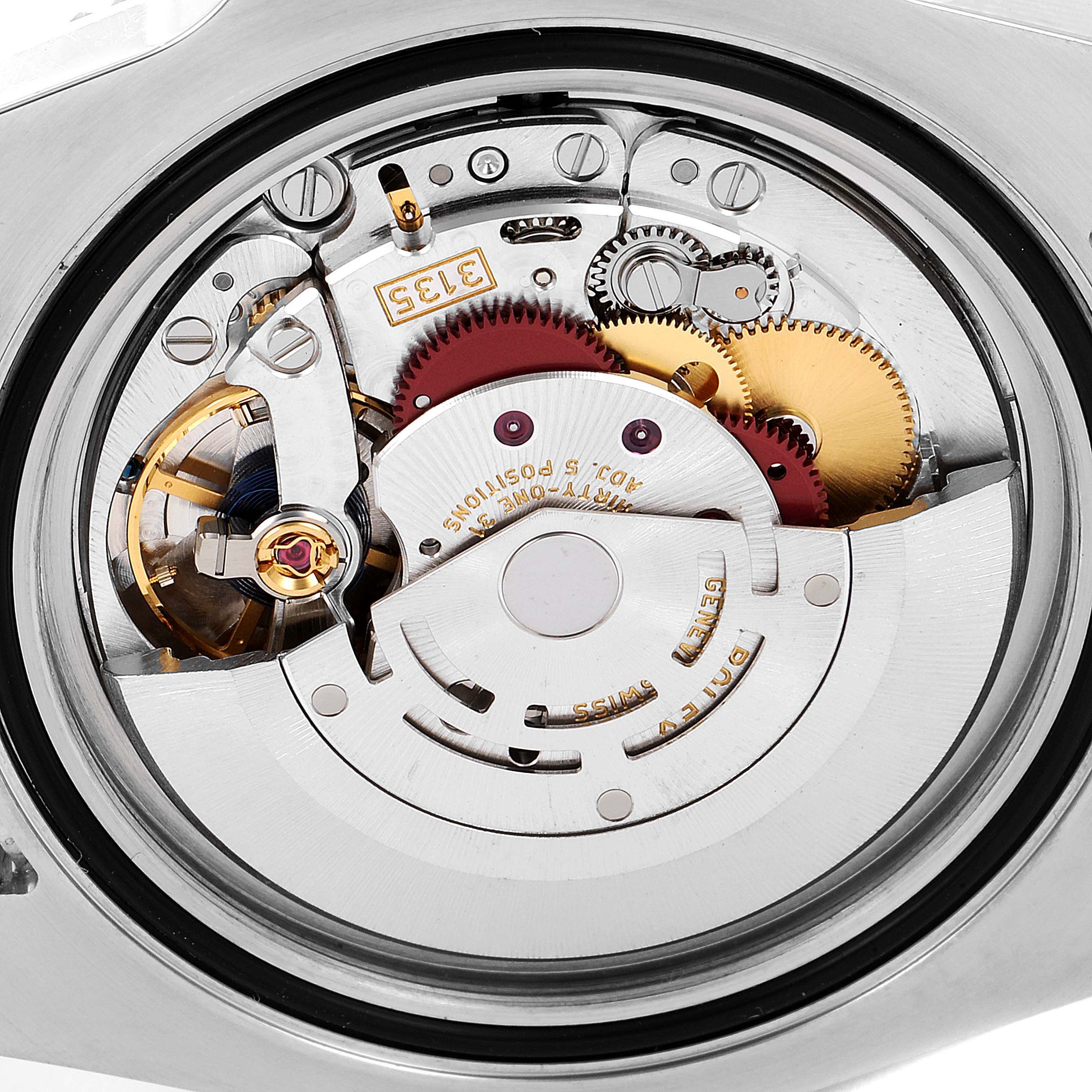 This image shows a close-up of the back and internal mechanism of a Rolex Submariner 116613 Men's Steel and Gold (two tone) Black Dial 116613 Men's Steel and Gold (two tone) Black Dial watch.