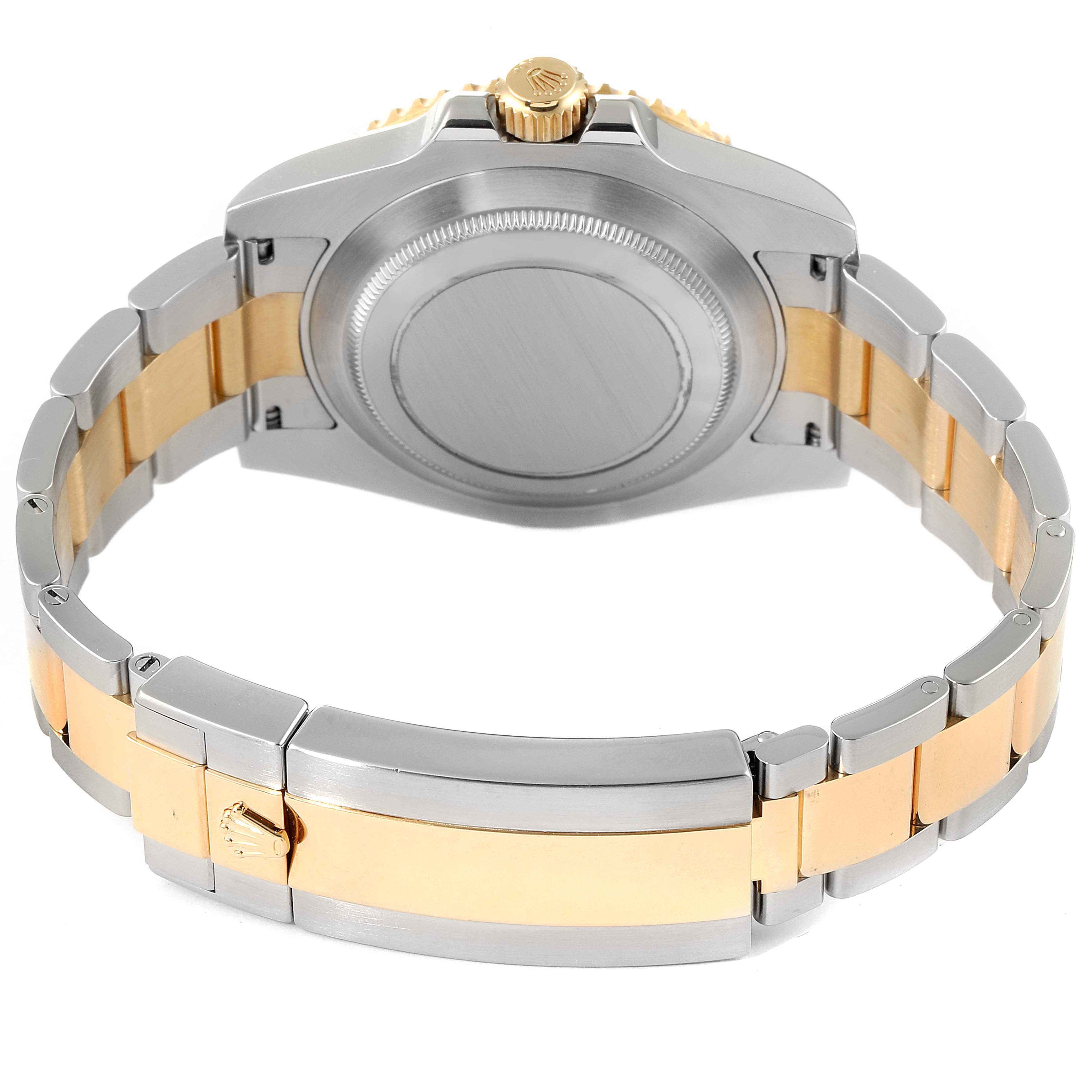 The image shows the back, clasp, and bracelet of a Rolex Submariner 116613 Men's Steel and Gold (two tone) Black Dial 116613 Men's Steel and Gold (two tone) Black Dial watch, highlighting the two-tone metal design.