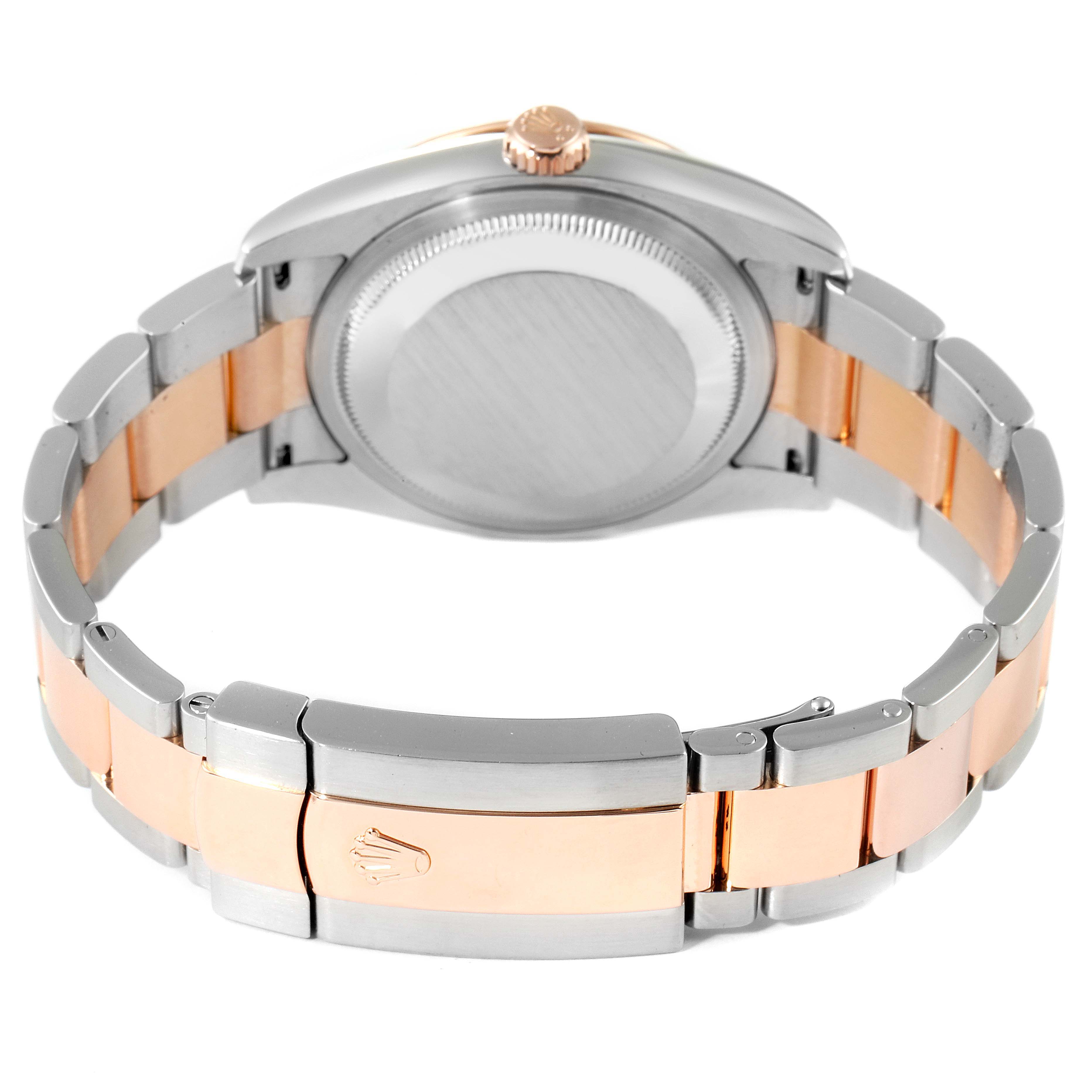 The image shows the back view of a Rolex Turn-o-Graph 116261 Men's Steel and Gold (two tone) Black Dial 116261 Men's Steel and Gold (two tone) Black Dial watch, highlighting the case back and the two-tone metal bracelet with the clasp.