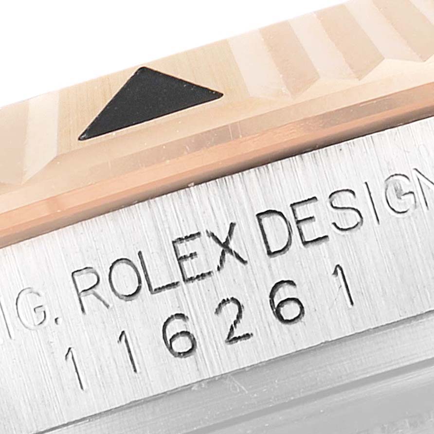 This image shows a close-up of the bezel and model number engraving on a Rolex Turn-o-Graph 116261 Men's Steel and Gold (two tone) Black Dial 116261 Men's Steel and Gold (two tone) Black Dial watch.